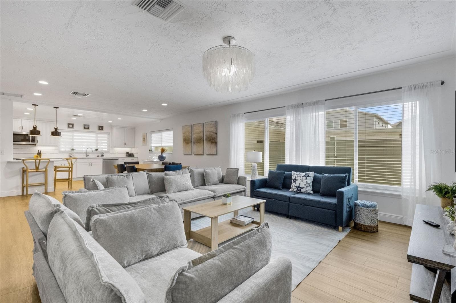 Open-concept layout creates an easy flow for everyday living and entertaining. - 18317 SUNSET BLVD, REDINGTON SHORES