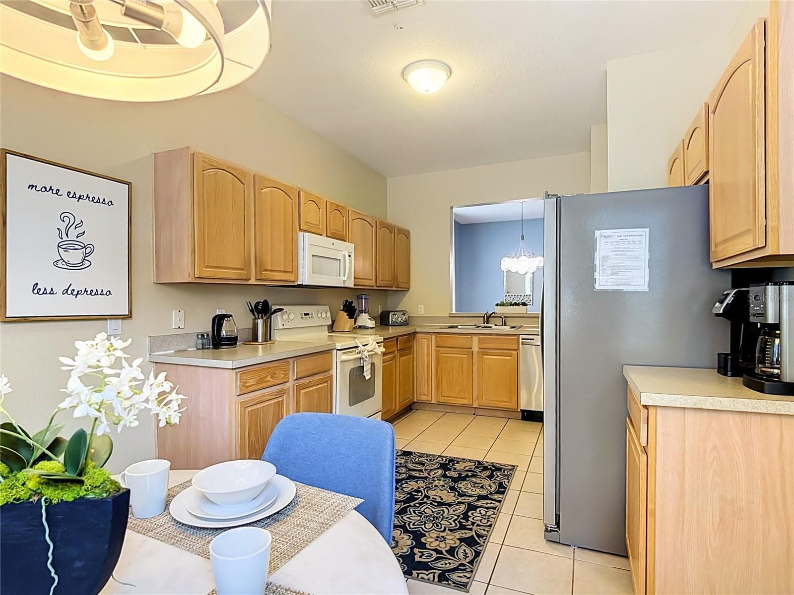 Spacious kitchen with breakfast nook overlooking the front of the home. - 7742 COMROW ST, KISSIMMEE