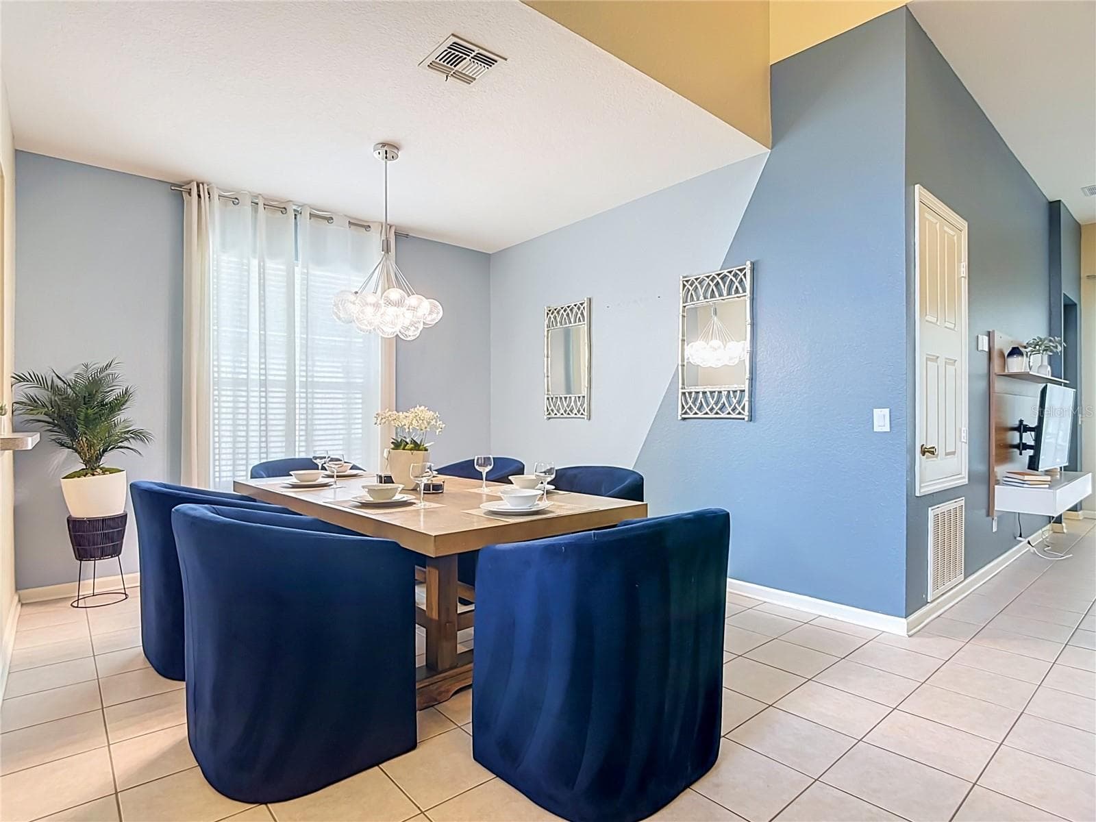 Bright dining area open to the main living space. - 7742 COMROW ST, KISSIMMEE