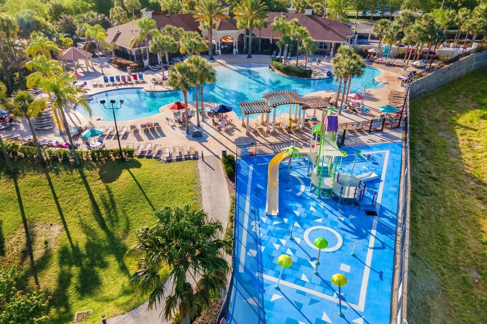 Splash pad and water playground perfect for younger guests. - 7742 COMROW ST, KISSIMMEE