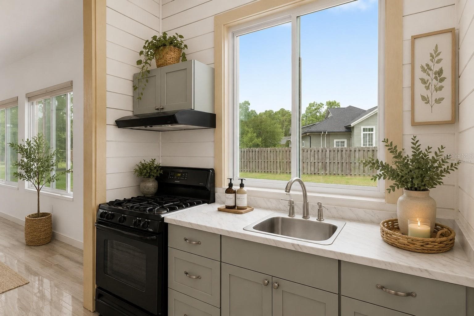 Conditioned Sunroom summer kitchen, virtually staged - 1446 SW 87TH ST, GAINESVILLE
