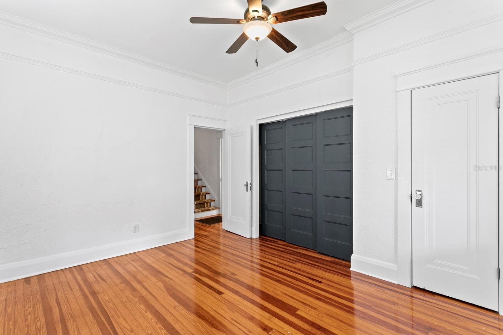 DOWNSTAIRS, FRONT BEDROOM W/CLOSET - 705 W WEST ST, TAMPA