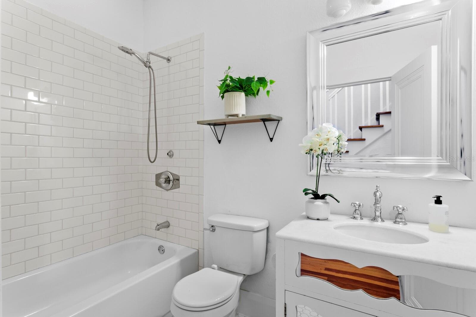 DOWNSTAIRS, FRONT BATHROOM - 705 W WEST ST, TAMPA