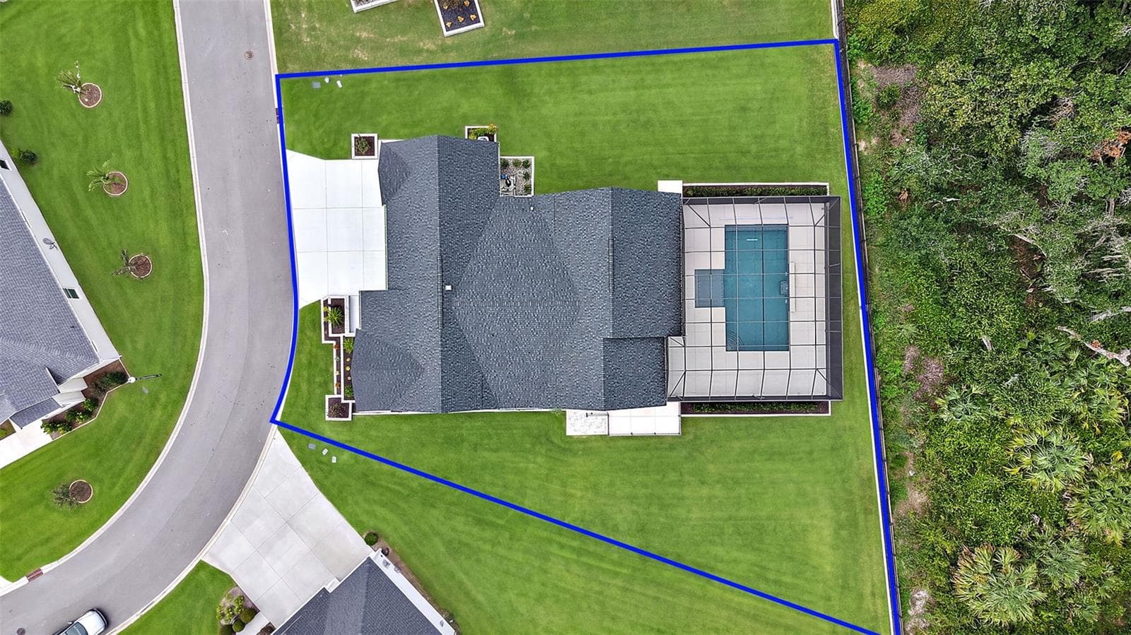 Aerial Side Elevation with Property Lines EXPANSIVE Lake Okahumpka PRESERVE VIEWS! - 724 SHIVERS LOOP, THE VILLAGES