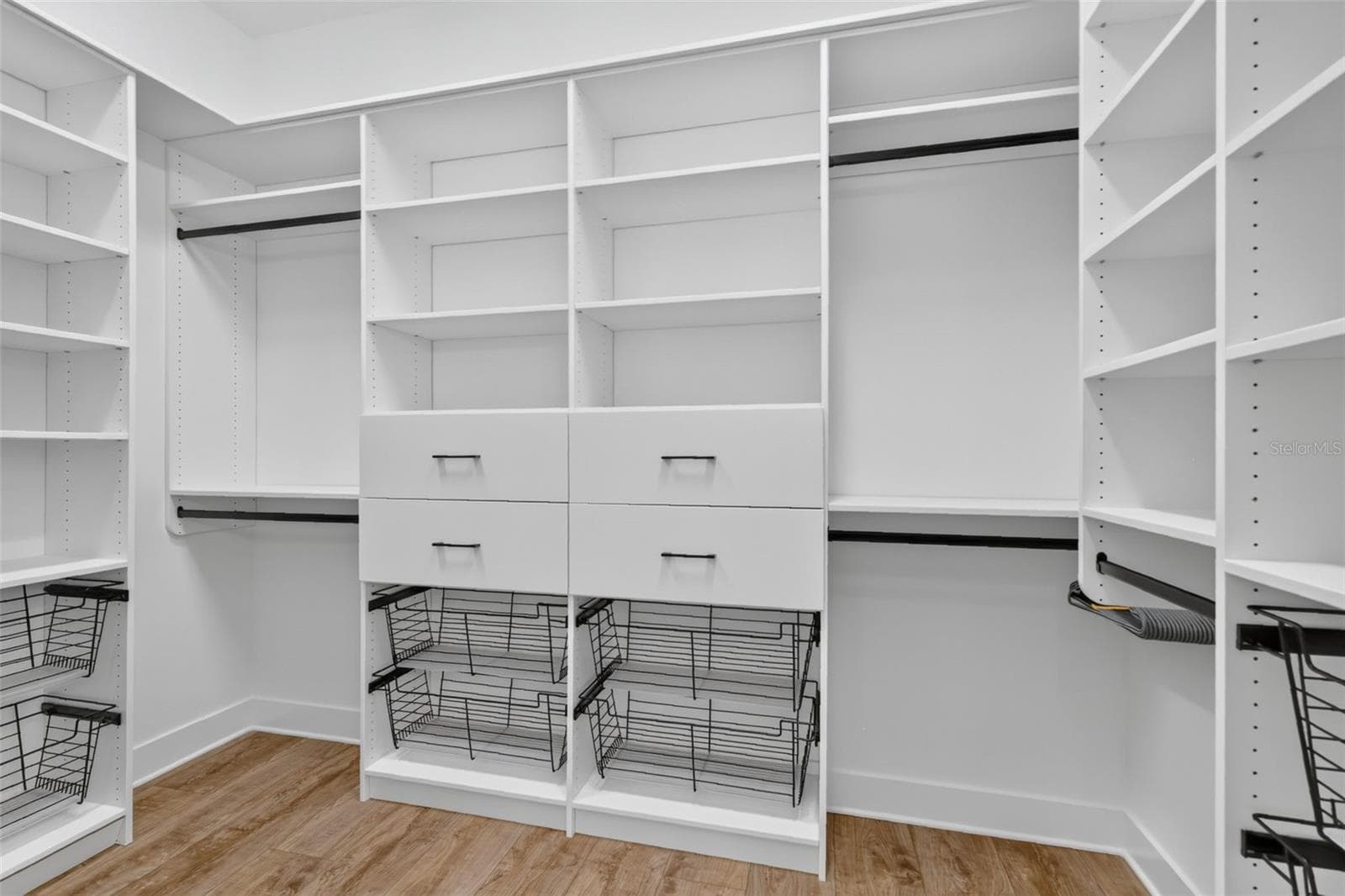 Primary Bedroom Customized Walk-In Closet - 724 SHIVERS LOOP, THE VILLAGES