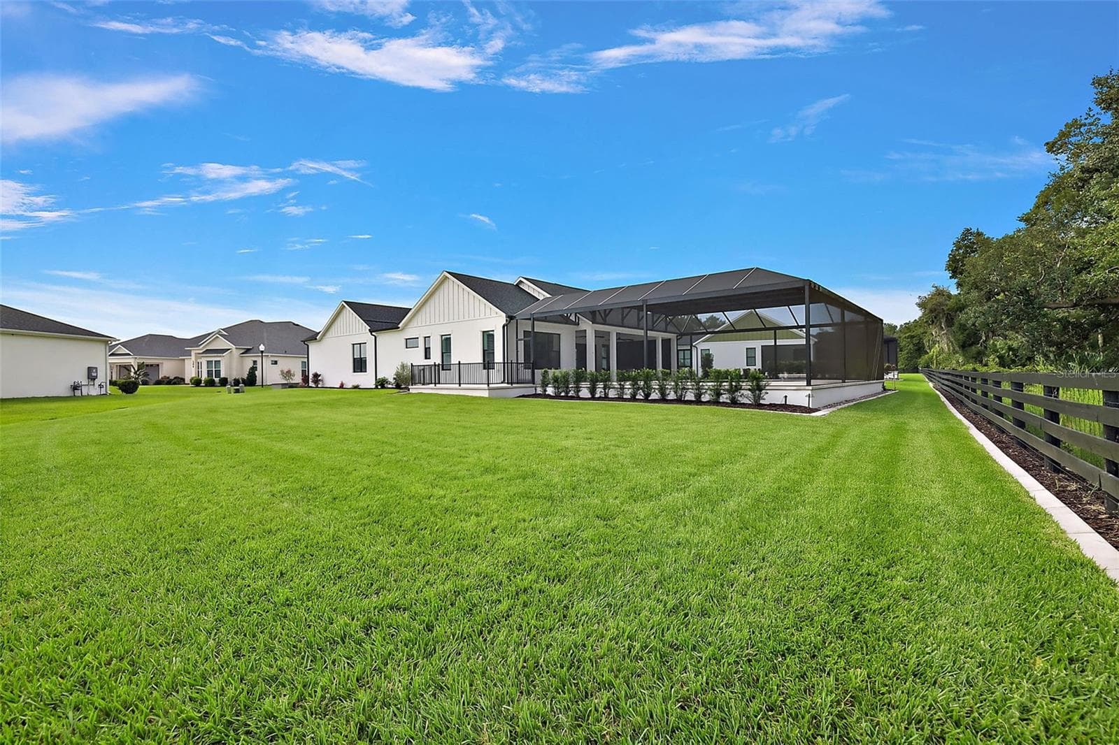 Rear and Side Elevation with SPACIOUS Yard - 724 SHIVERS LOOP, THE VILLAGES