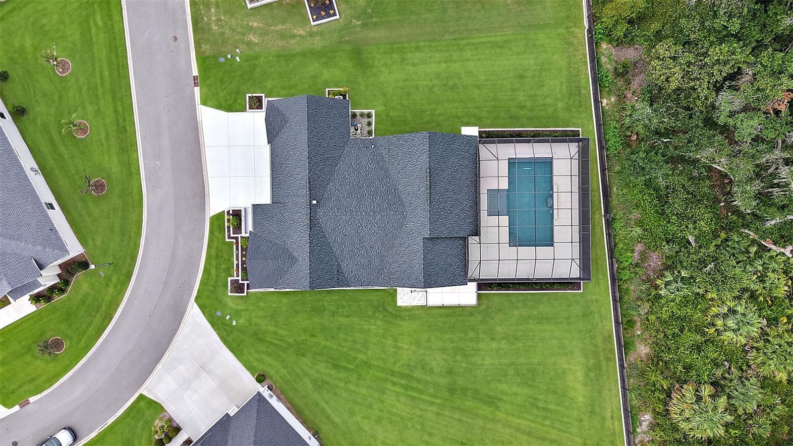 Aerial Side Elevation with Lake Okahumpka PRESERVE - 724 SHIVERS LOOP, THE VILLAGES