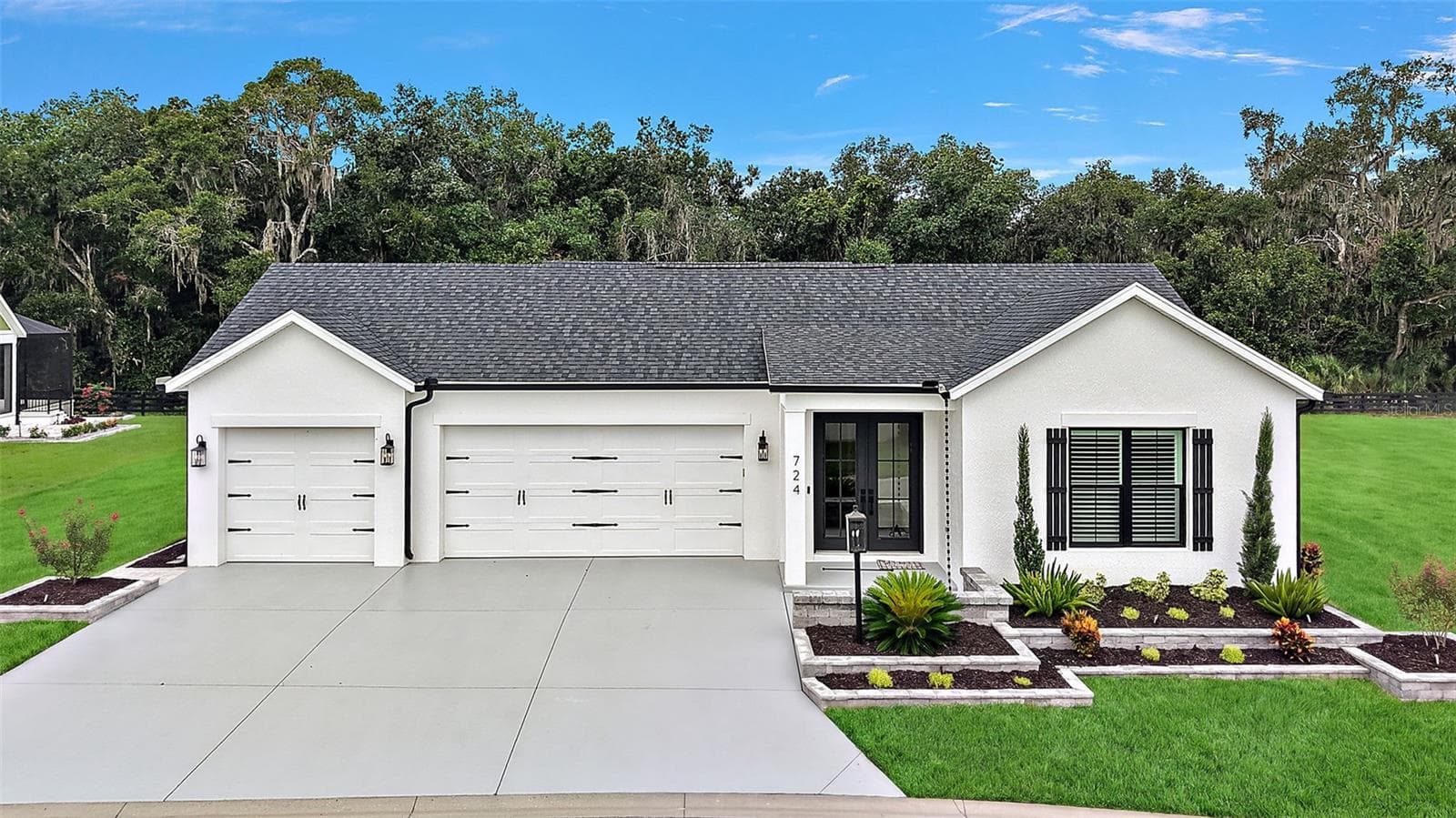 Aerial Front Elevation with Lake Okahumpka PRESERVE - 724 SHIVERS LOOP, THE VILLAGES