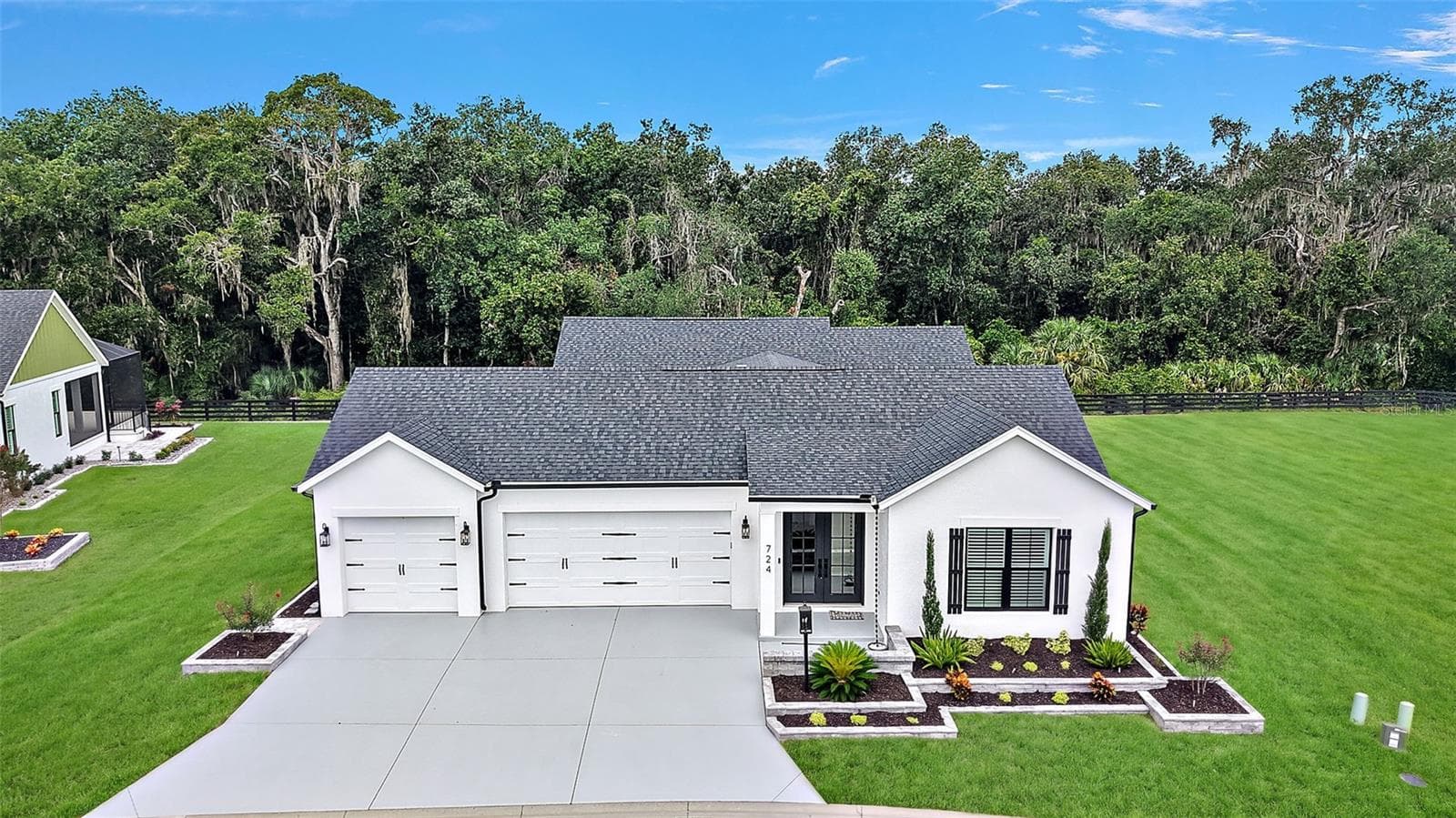 Aerial Front Elevation with Lake Okahumpka PRESERVE - 724 SHIVERS LOOP, THE VILLAGES