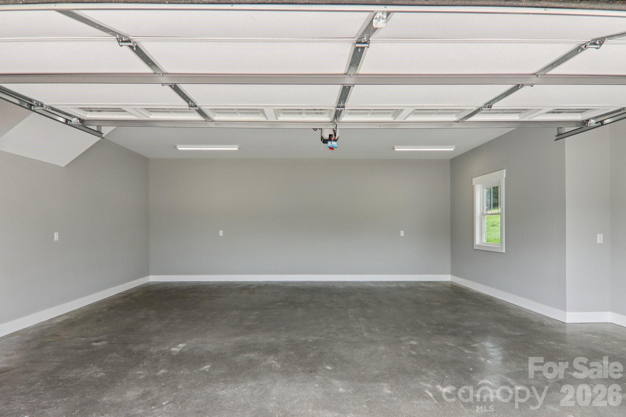 Two car garage. - 1060 California Creek Road, Mars Hill