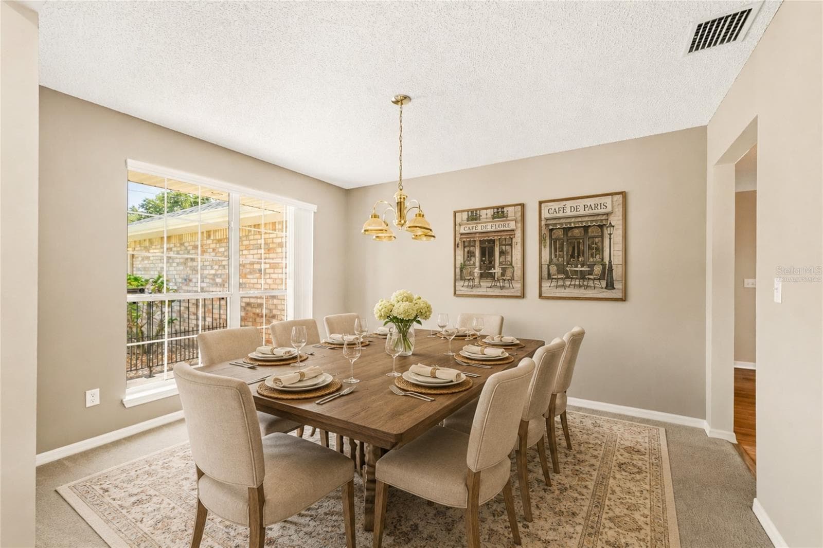 Virtually Staged Dining Room - 38 PRINCESS ROSE DR, PALM COAST