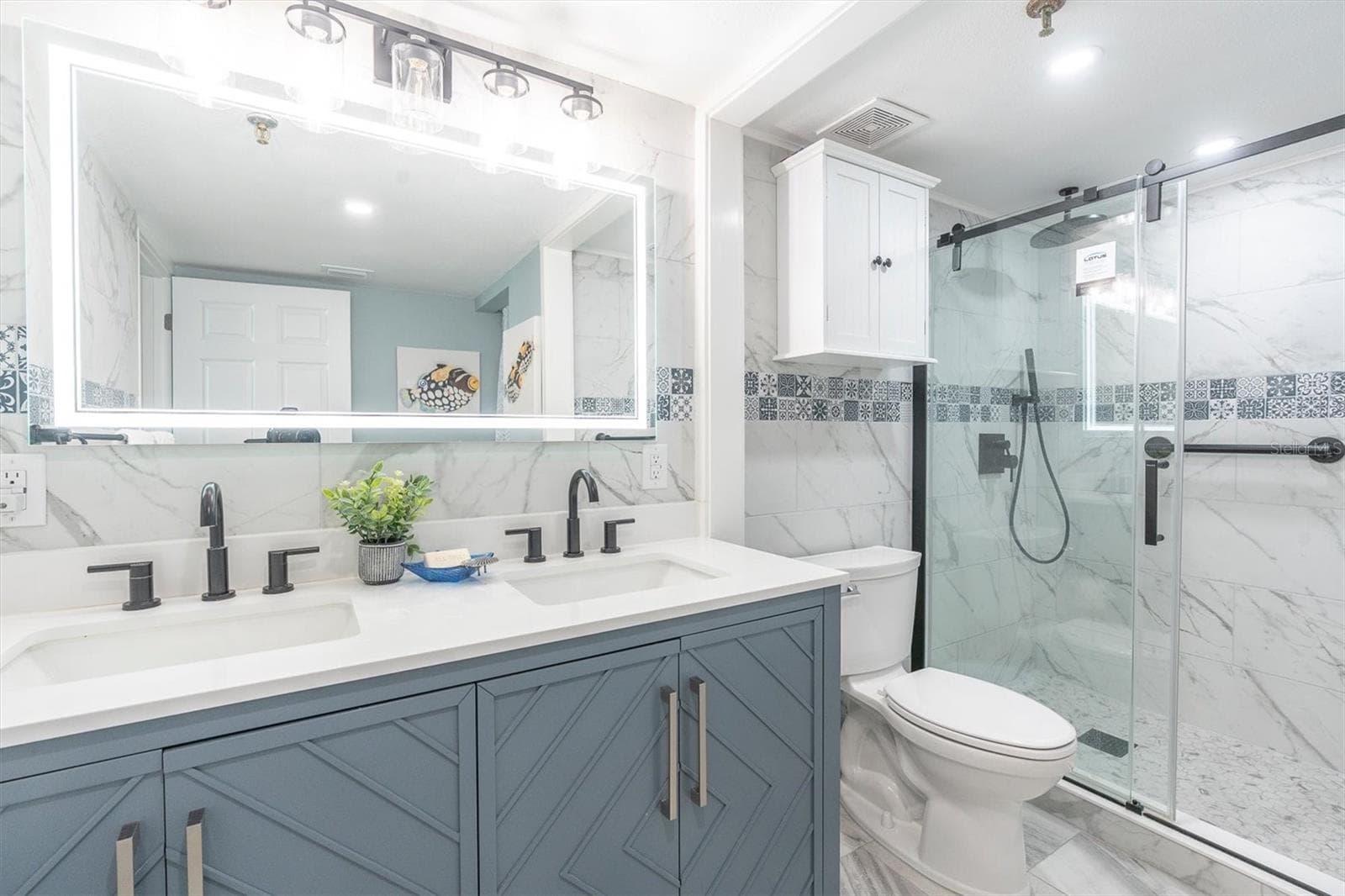 Remodeled 2025 Primary Bath with Dual Vanity - 6287 BAHIA DEL MAR CIR #401, ST PETERSBURG