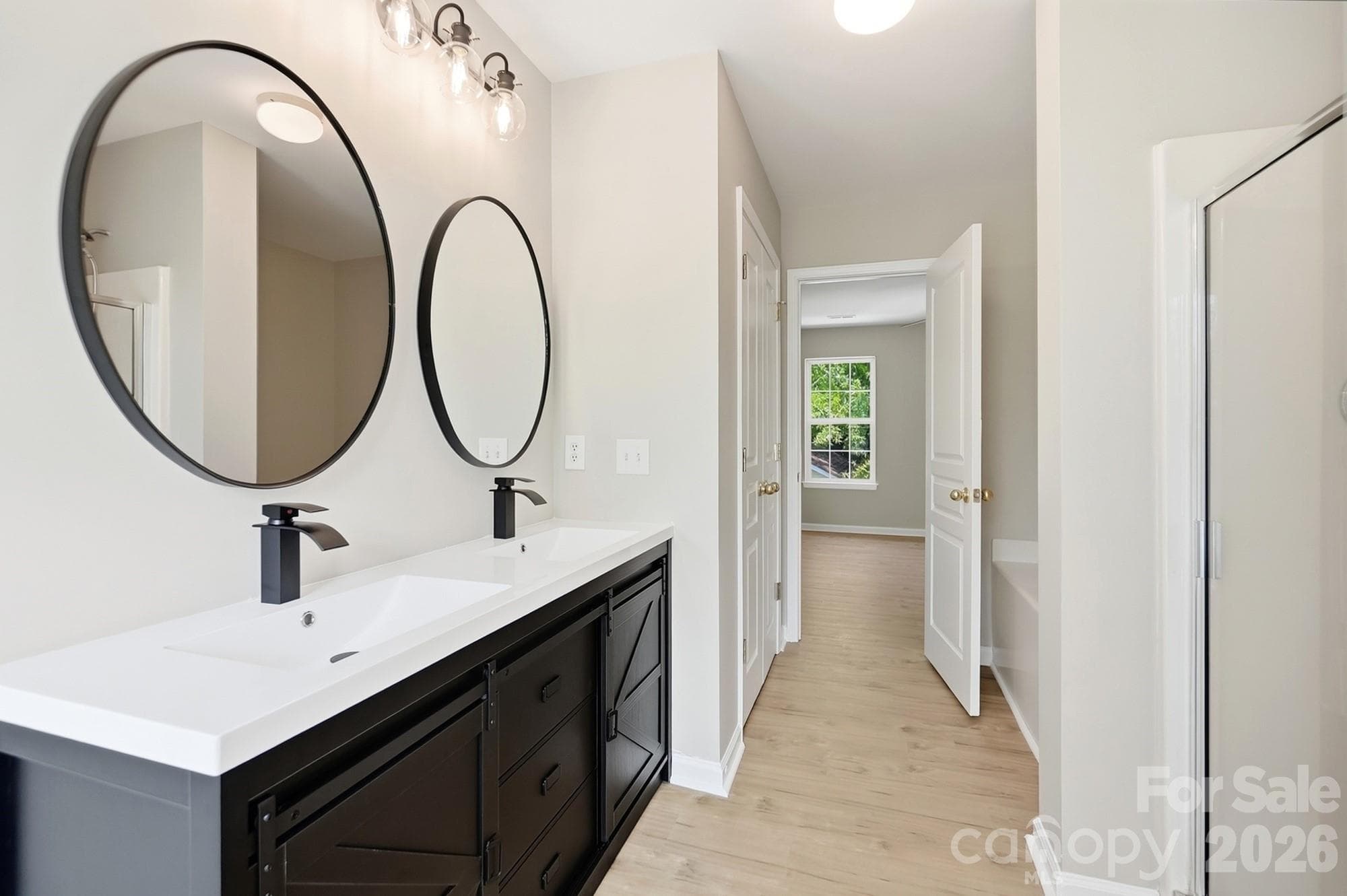 Primary bedroom also has a large linen closet - 11402 Heritage Green Drive, Cornelius