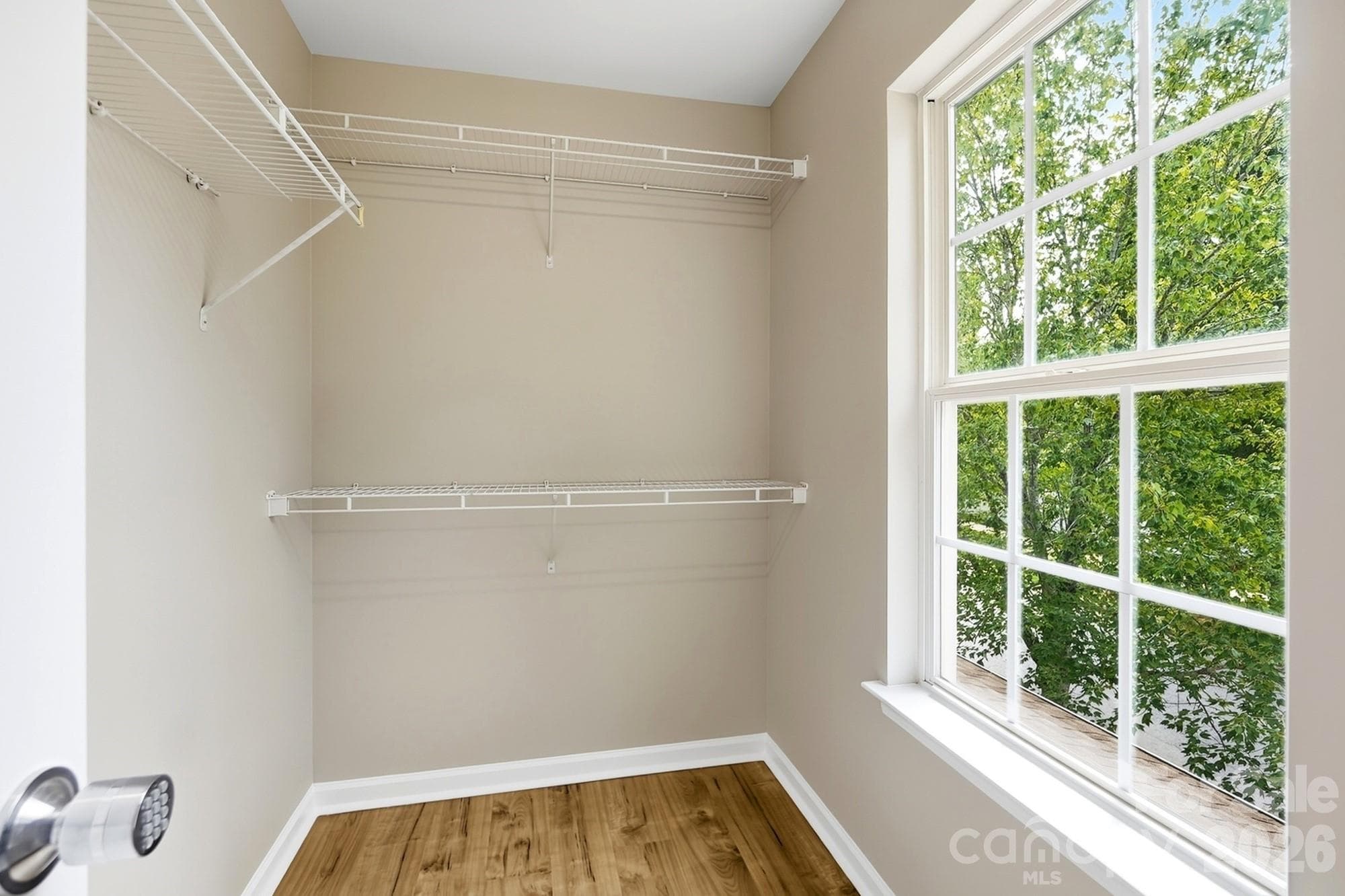 Walk-in closet off of Primary bathroom - 11402 Heritage Green Drive, Cornelius