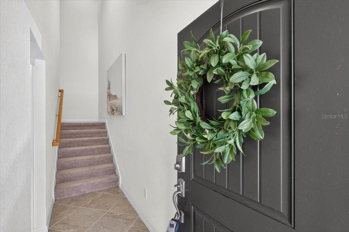 Front Door and stairs to the main floor - 10059 CROOKED CREEK DR #202, VENICE