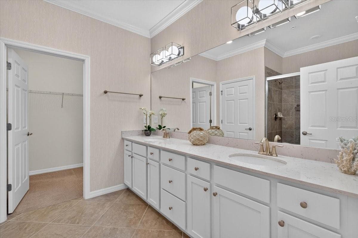 Primary Bathroom with two sinks - 10059 CROOKED CREEK DR #202, VENICE