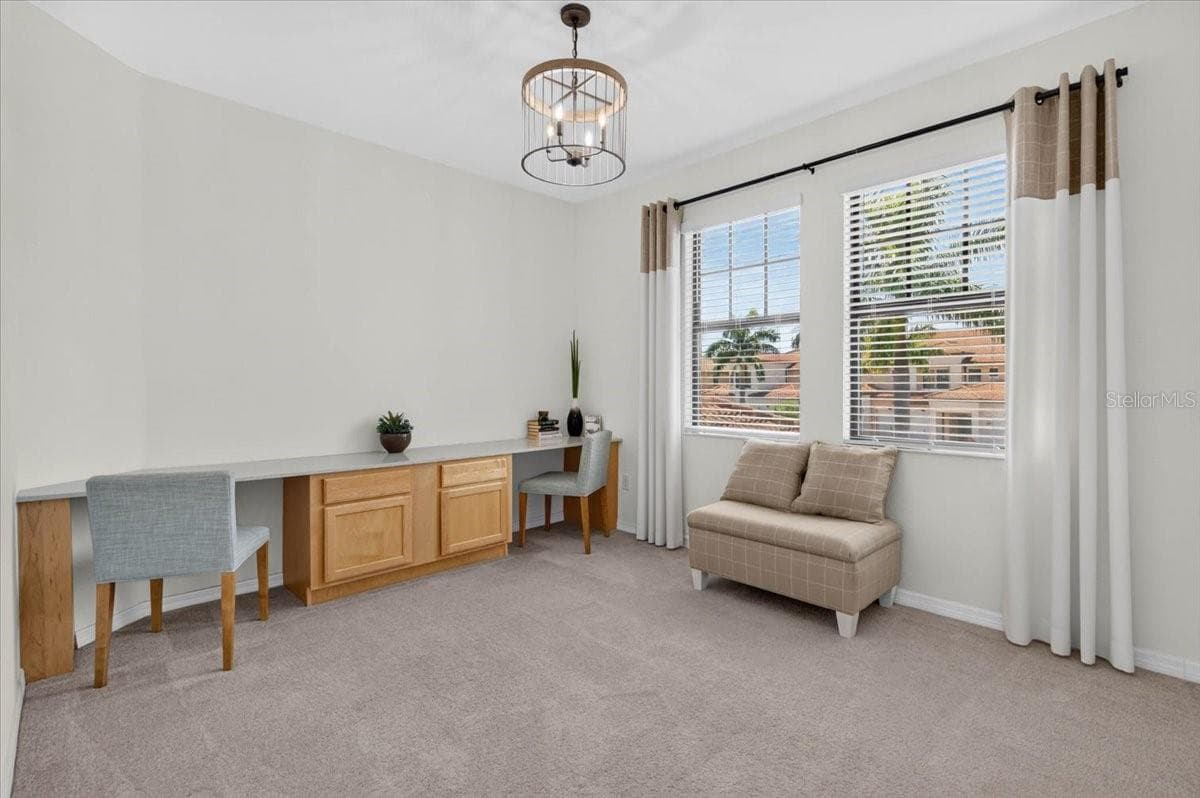 Third Bedroom with build-in desk, designer light fixture and window treatments - 10059 CROOKED CREEK DR #202, VENICE