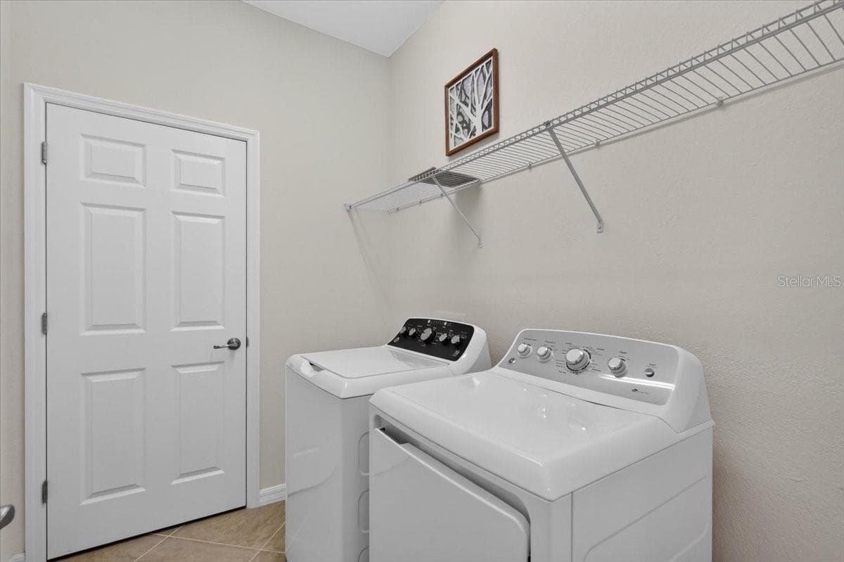 Laundry Room with extra space - 10059 CROOKED CREEK DR #202, VENICE