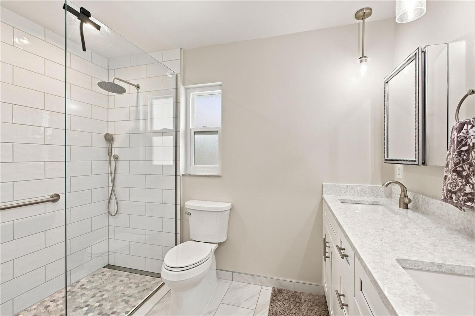 Primary En-Suite Bath with dual sinks and tile shower - 302 DEGAS DR, NOKOMIS