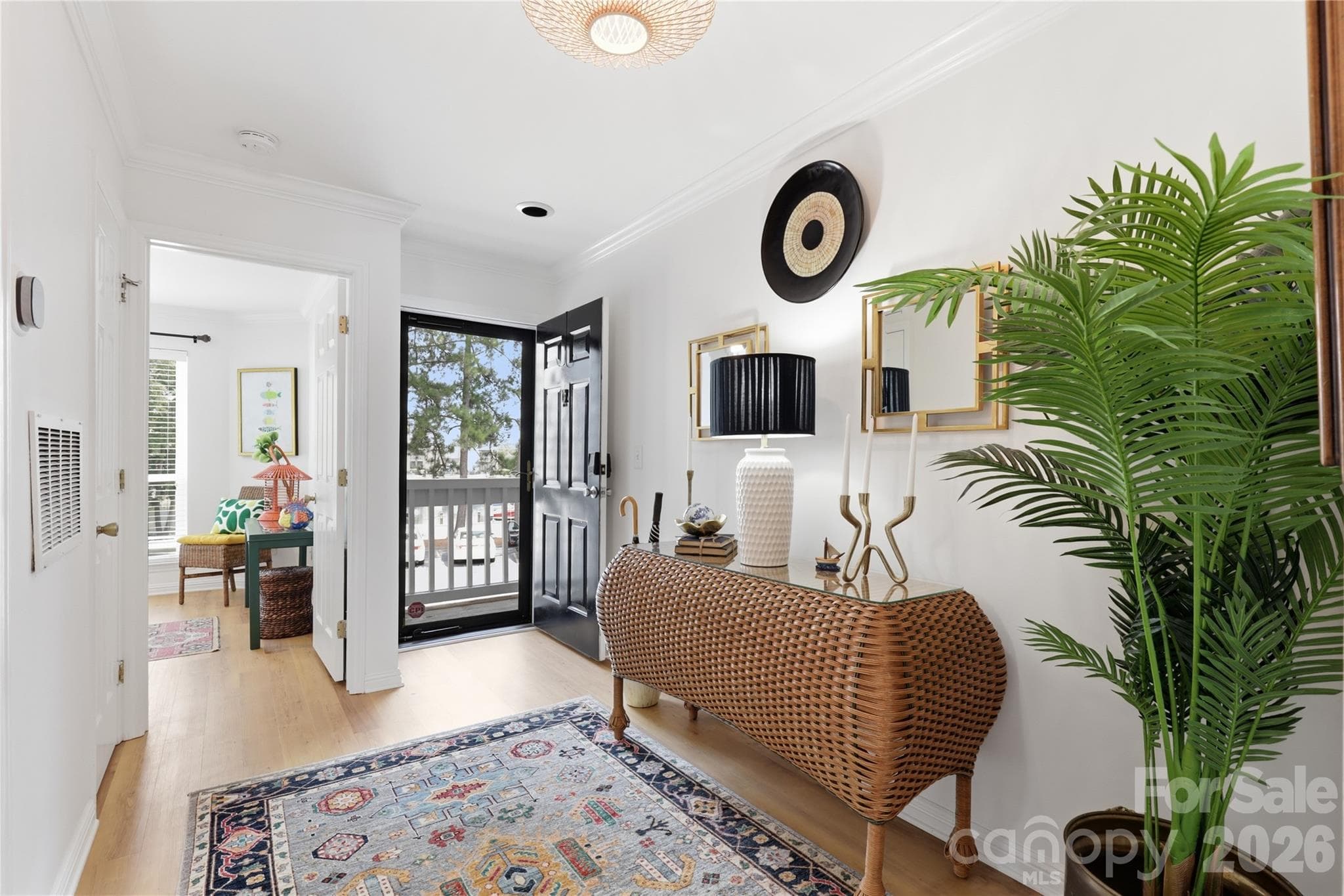 Open connection between the living and dining areas. - 932 Southwest Drive, Davidson