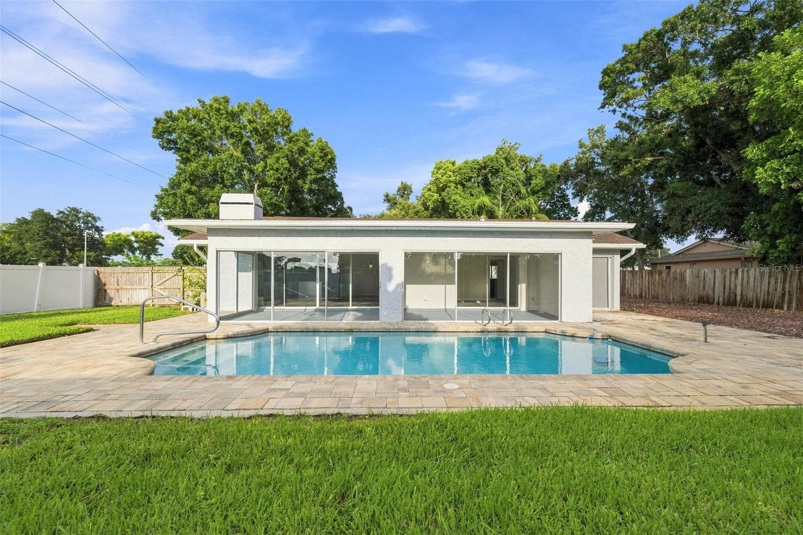 Enjoy the fenced backyard and pool - 3276 FOX HILL DR, CLEARWATER