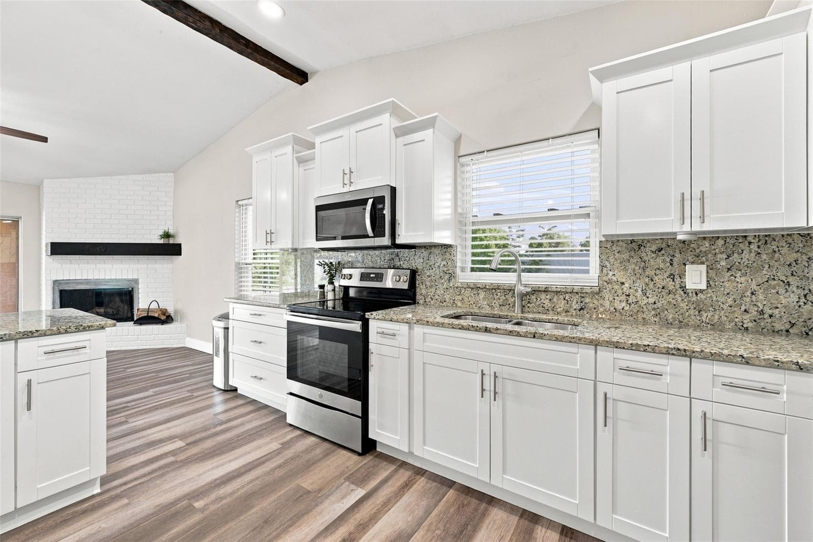 Love the window over the sink - 3276 FOX HILL DR, CLEARWATER