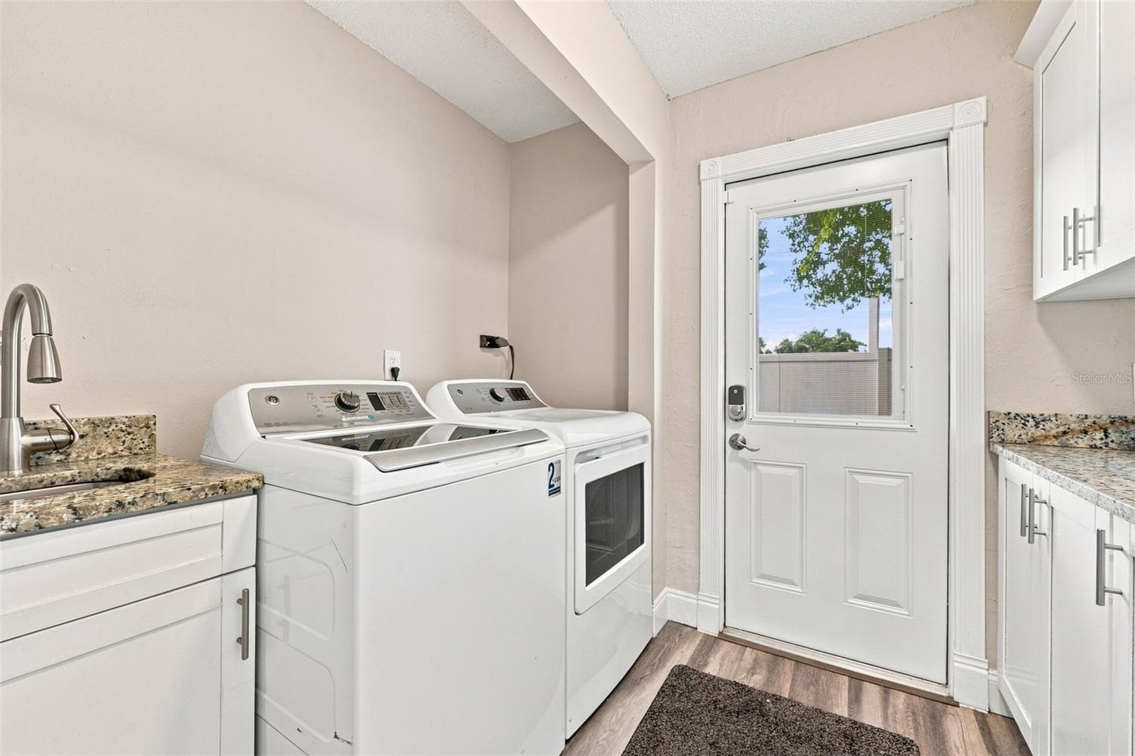 Laundry room - washer and dryer convey! - 3276 FOX HILL DR, CLEARWATER