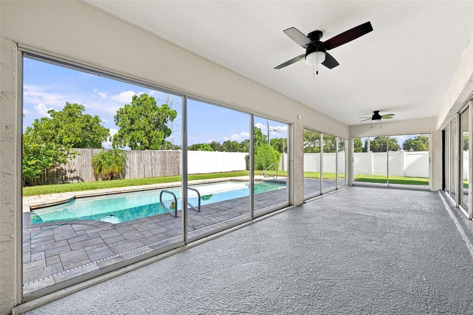 View of Pool and fenced backyard - 3276 FOX HILL DR, CLEARWATER