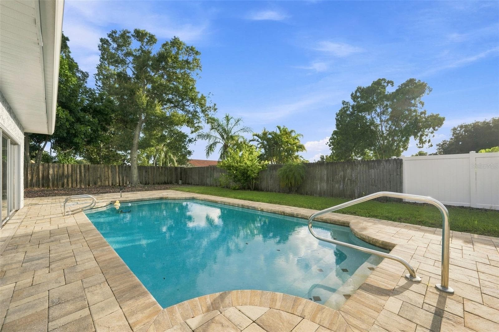 Resurfaced pool with beautiful pavers - 3276 FOX HILL DR, CLEARWATER