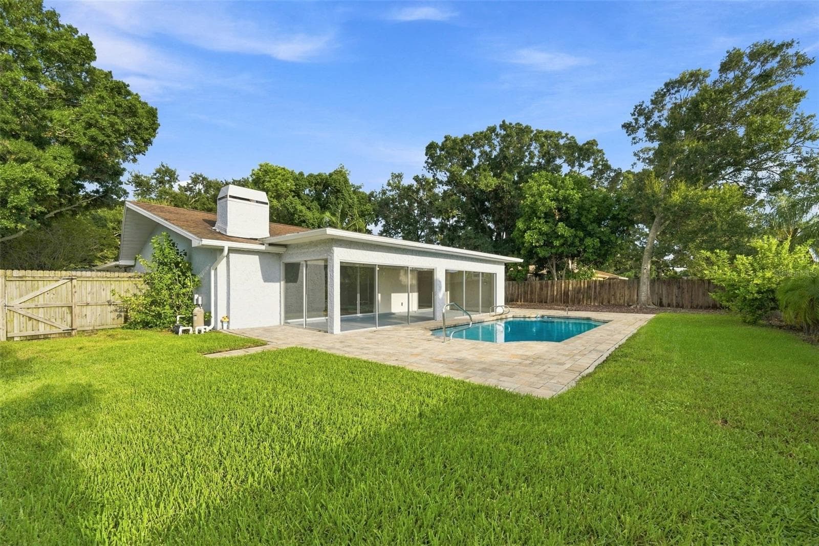 Large gate to backyard - 3276 FOX HILL DR, CLEARWATER