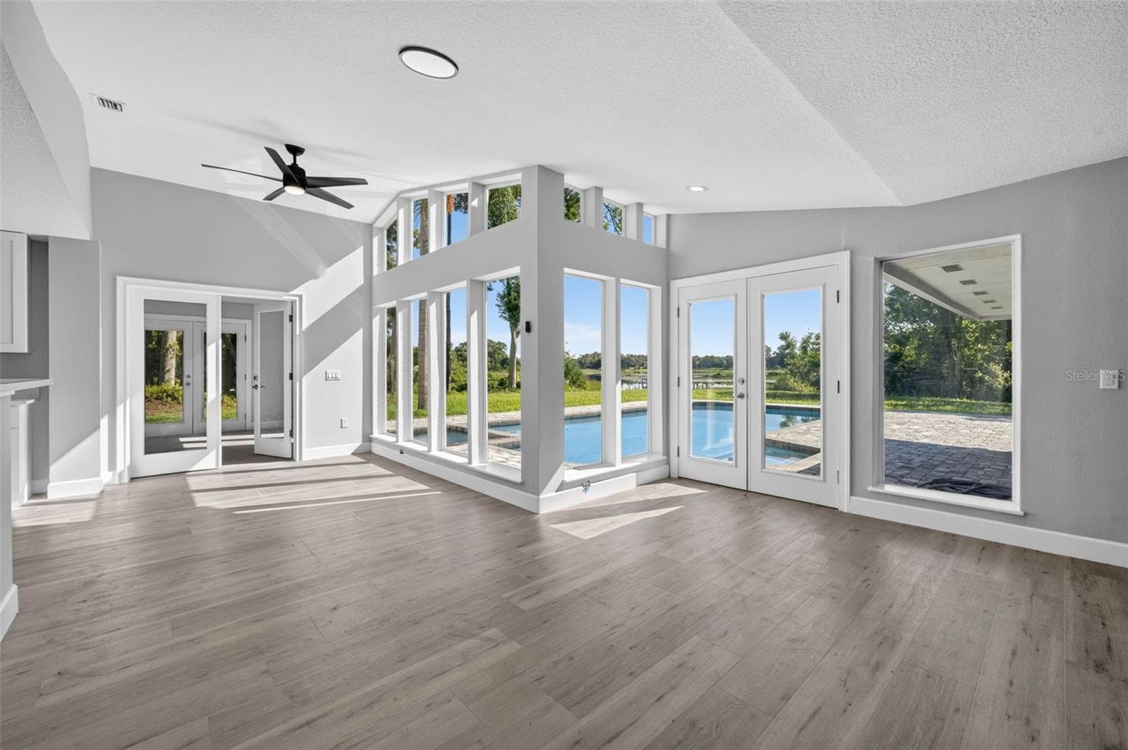 Family room-water views - 401 N 1ST ST, LAKE MARY