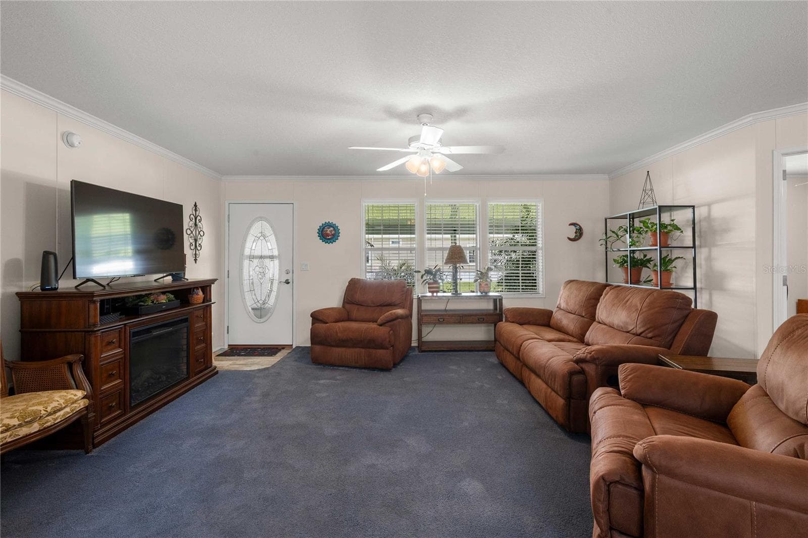 Open living room and kitchen. - 38417 MONET DR, ZEPHYRHILLS