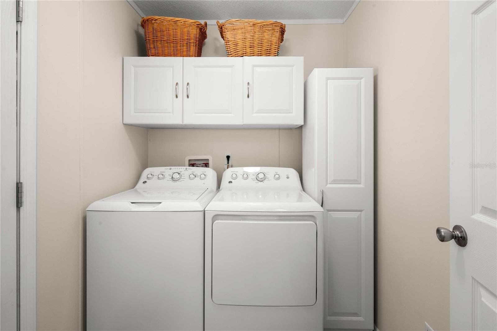 Inside laundry area. - 38417 MONET DR, ZEPHYRHILLS