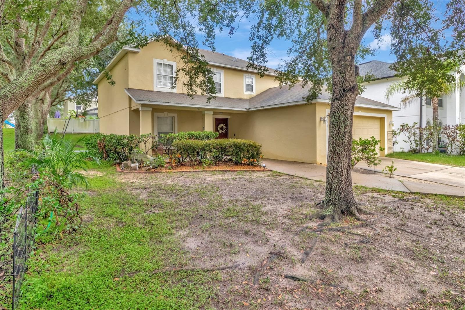 Front Yard - 216 TRES REYES LN, GROVELAND