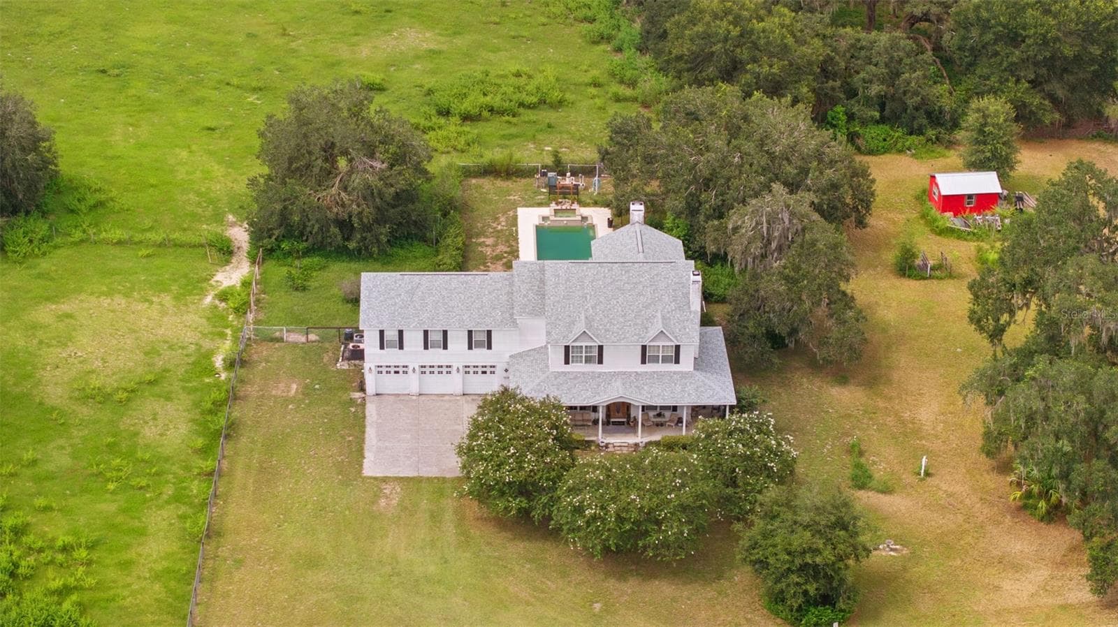 Single Family Residence at 13621 MCINTOSH RD, THONOTOSASSA, photo 2 of 35