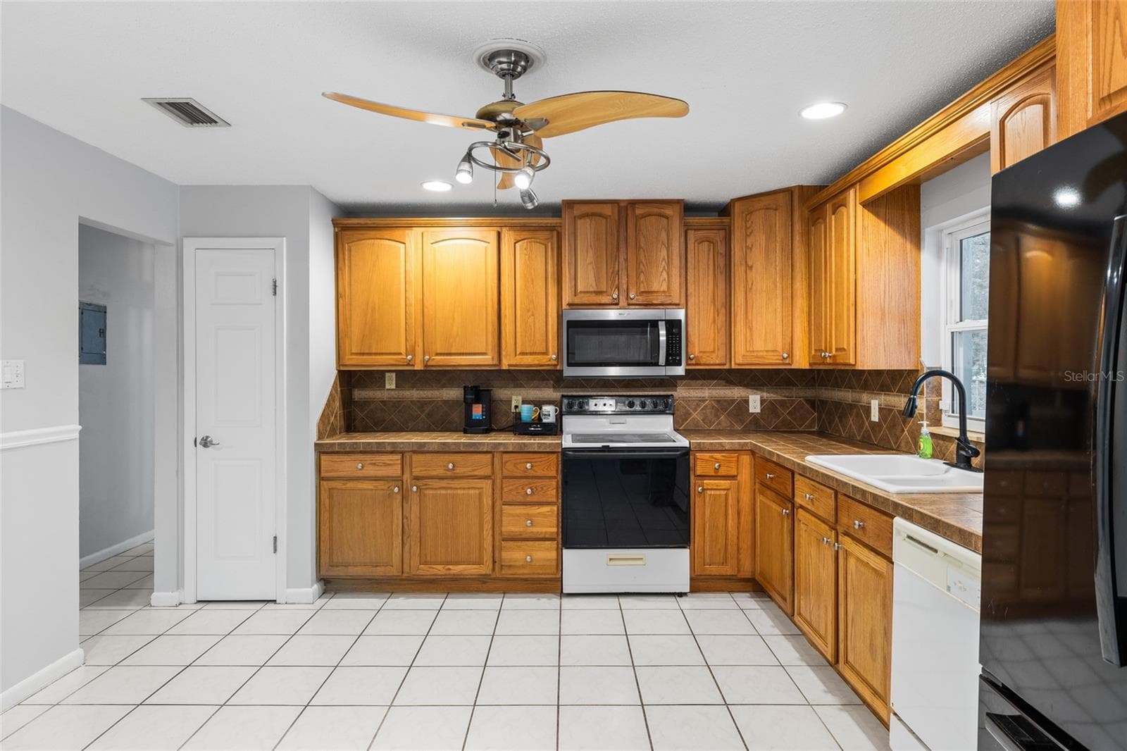 Single Family Residence at 7402 W KNIGHTS GRIFFIN RD, PLANT CITY, photo 11 of 40