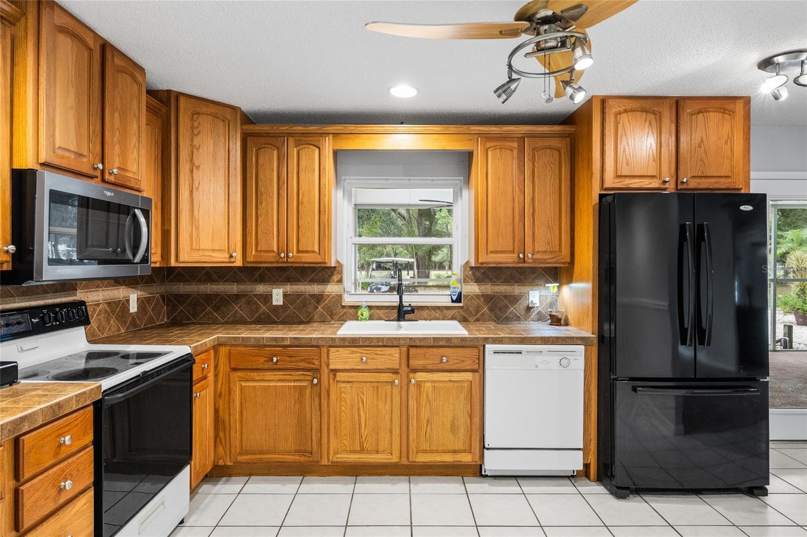Single Family Residence at 7402 W KNIGHTS GRIFFIN RD, PLANT CITY, photo 13 of 40