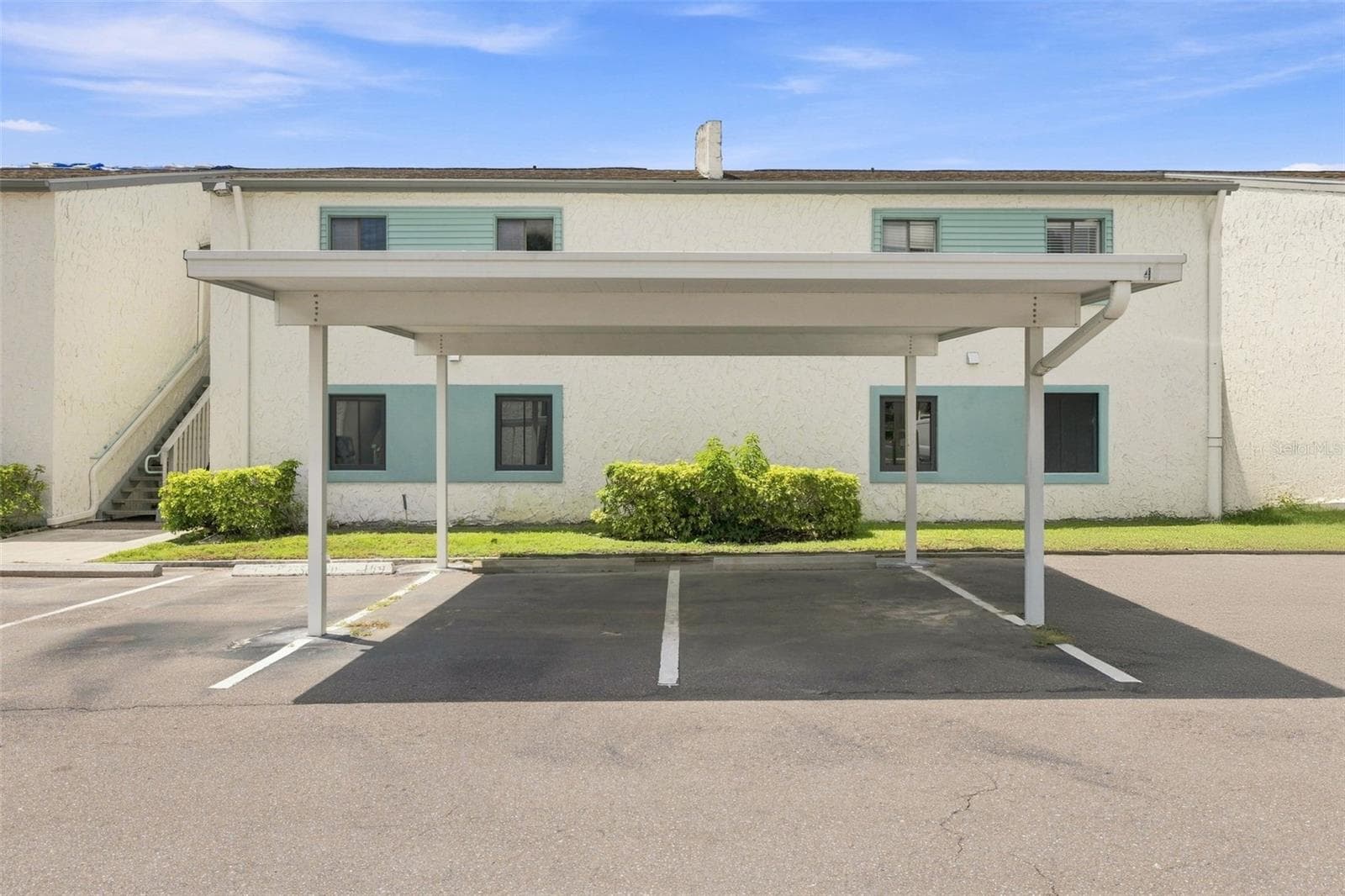 Carport is on Left Side on Across from Bldg 15. - 11409 8TH ST N #1504, ST PETERSBURG