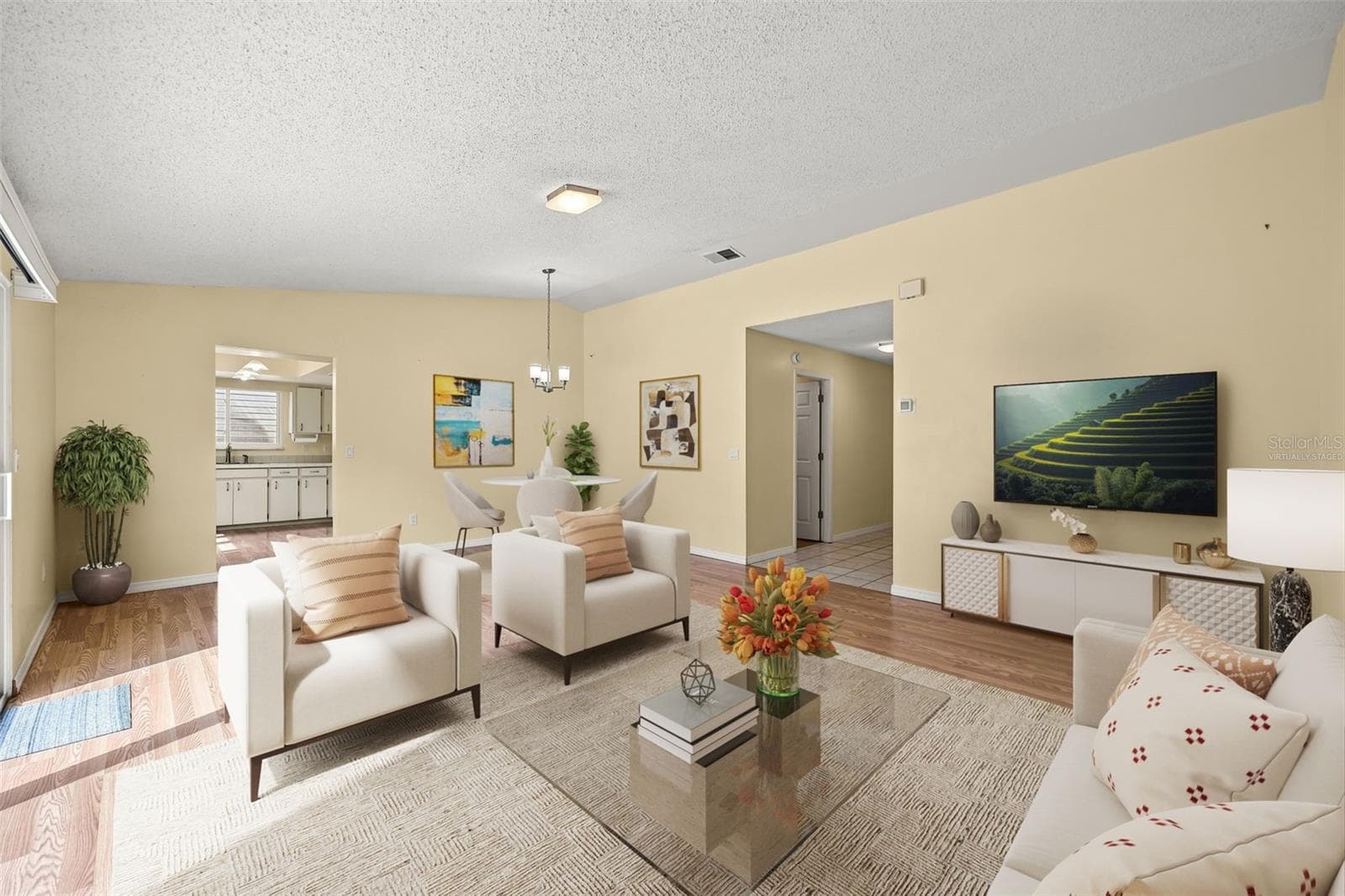 Virtually staged Dining and Living Room area right off the kitchen - 2808 TAMARACK TRL, APOPKA