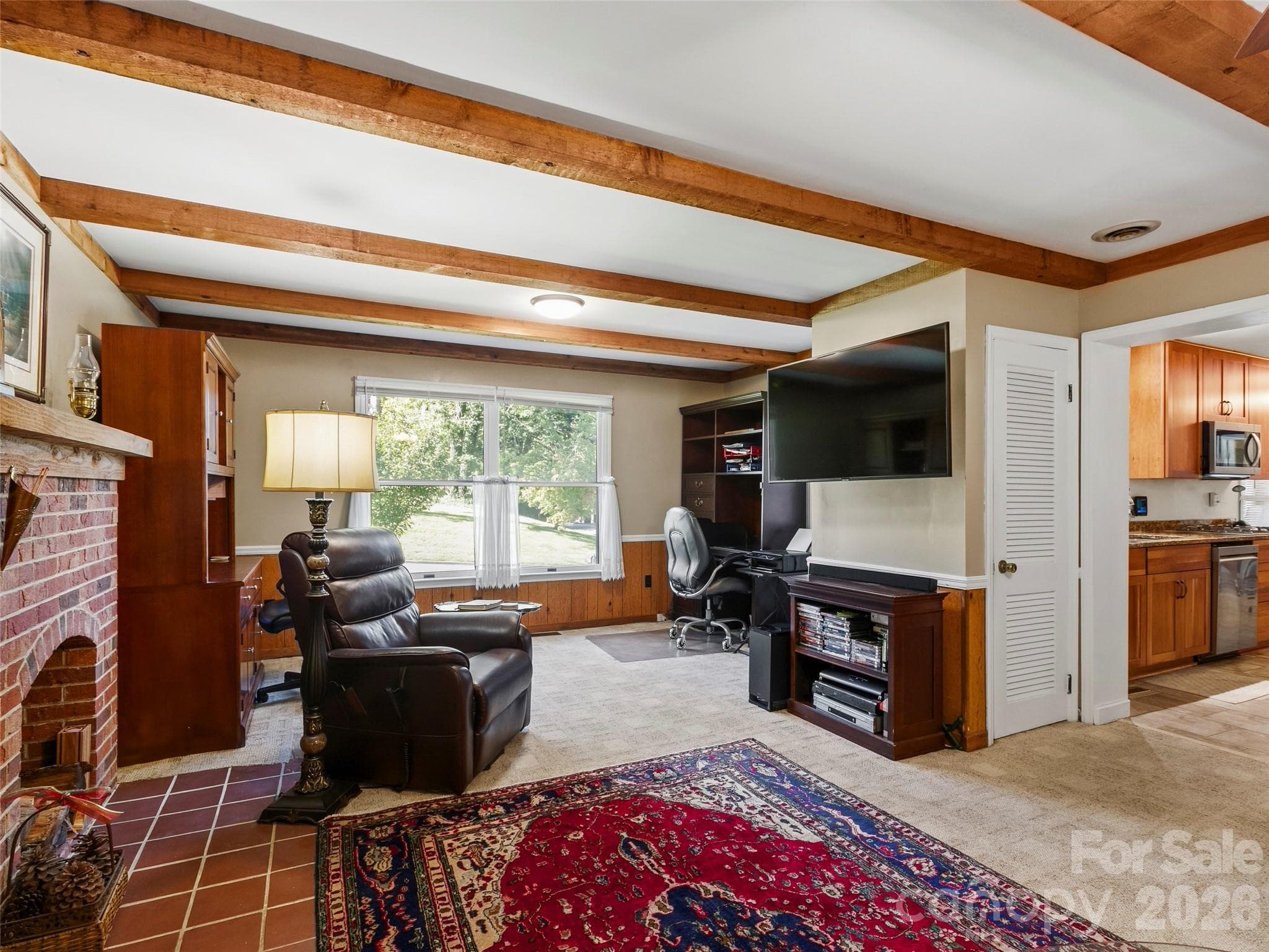 Cozy living room with accent beams and work-from-home space - 101 Castlerock Drive, Asheville