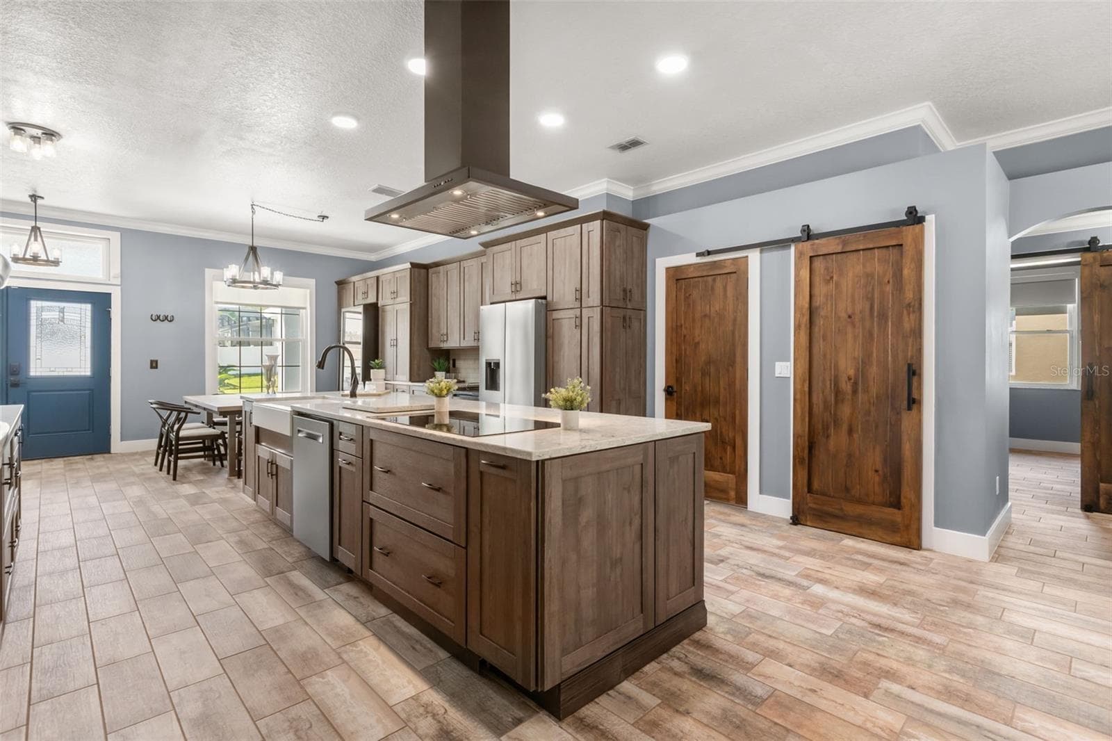 Storage in the pantry, laundry and garage access ~ Smartly built-in drop zone organization on the right by laundry room access ~ - 5006 RISHLEY RUN WAY, MOUNT DORA