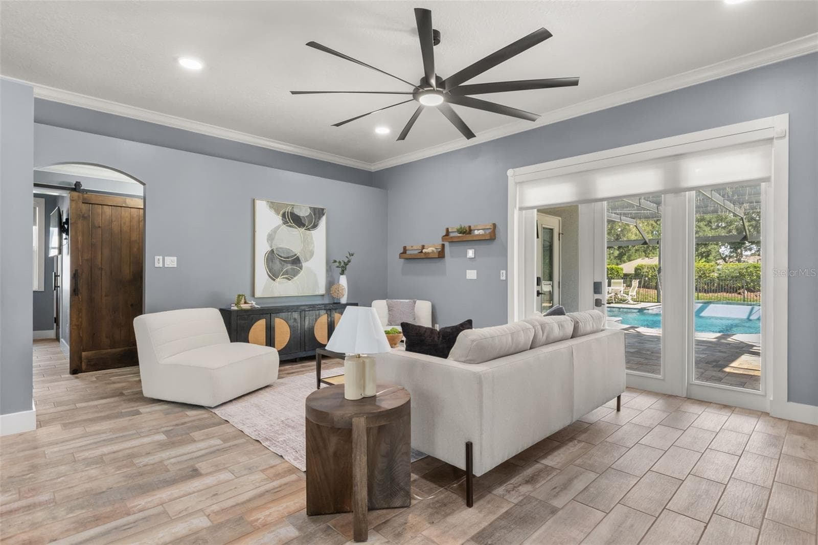 Glass doors and windows in the family room allow views to the amazing backyard ~ - 5006 RISHLEY RUN WAY, MOUNT DORA