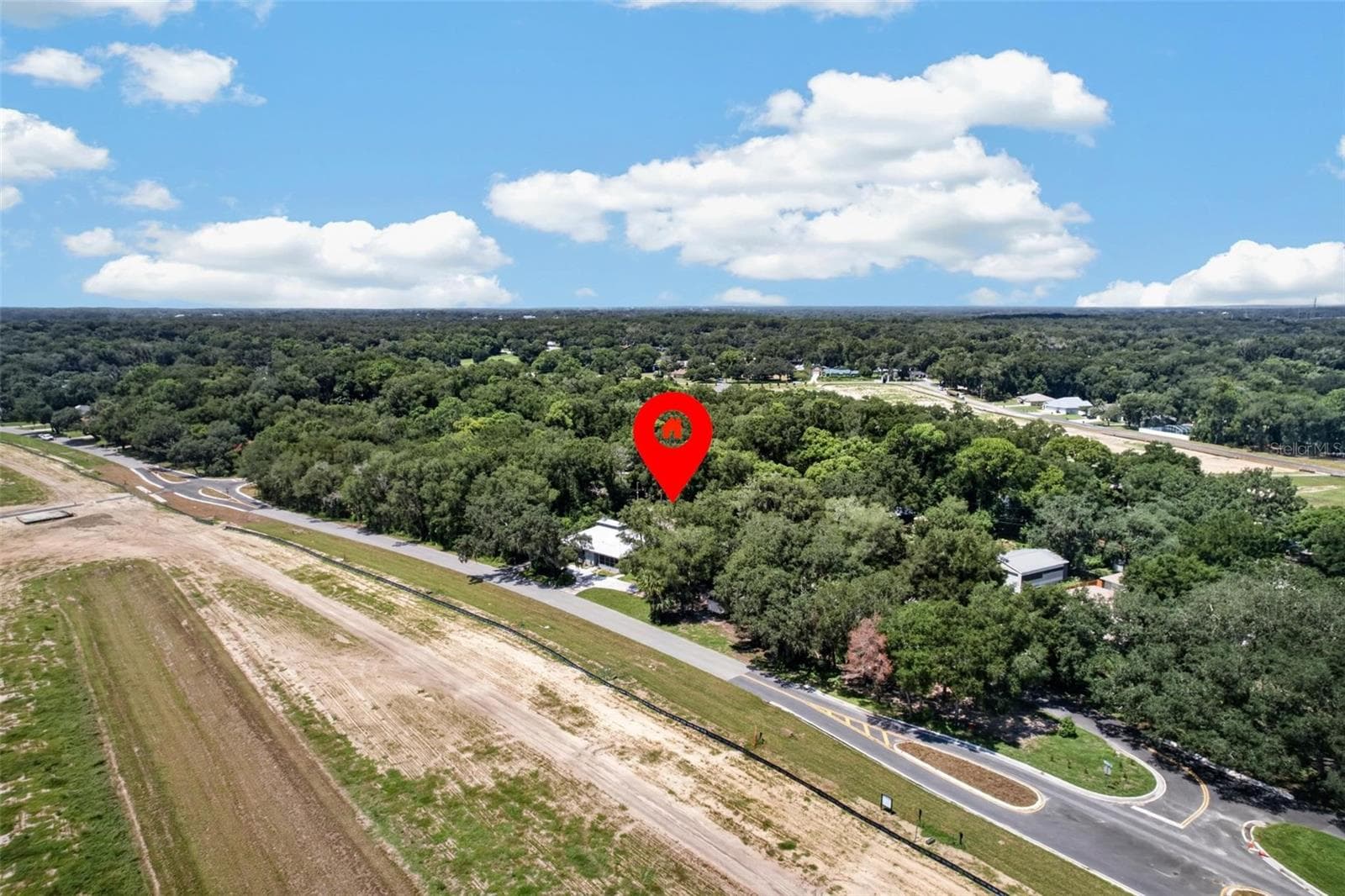 Aerial of property in community - 25717 TROON AVE, SORRENTO