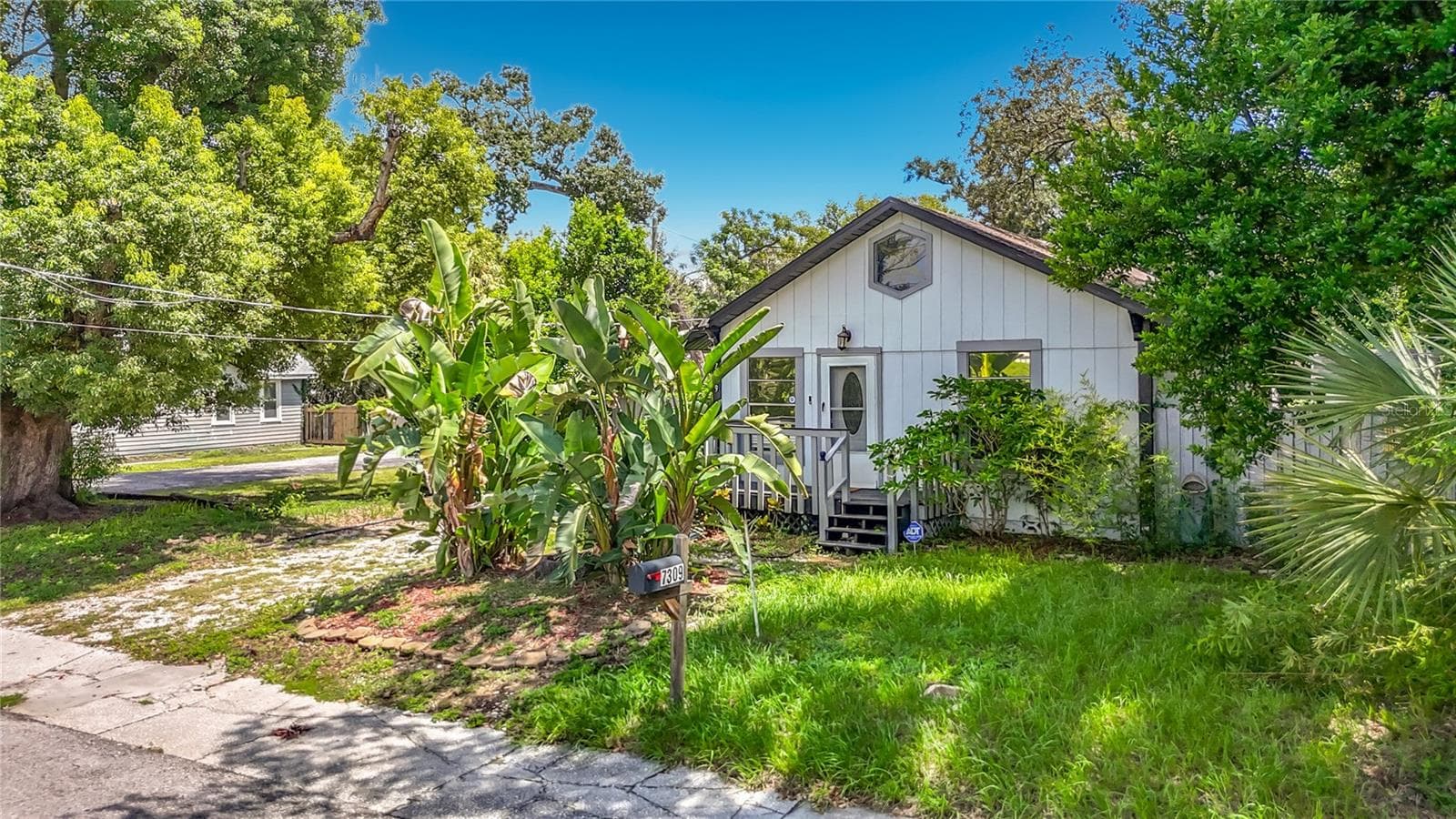 Single Family Residence at 7309 N HUNTLEY AVE, TAMPA, photo 2 of 63