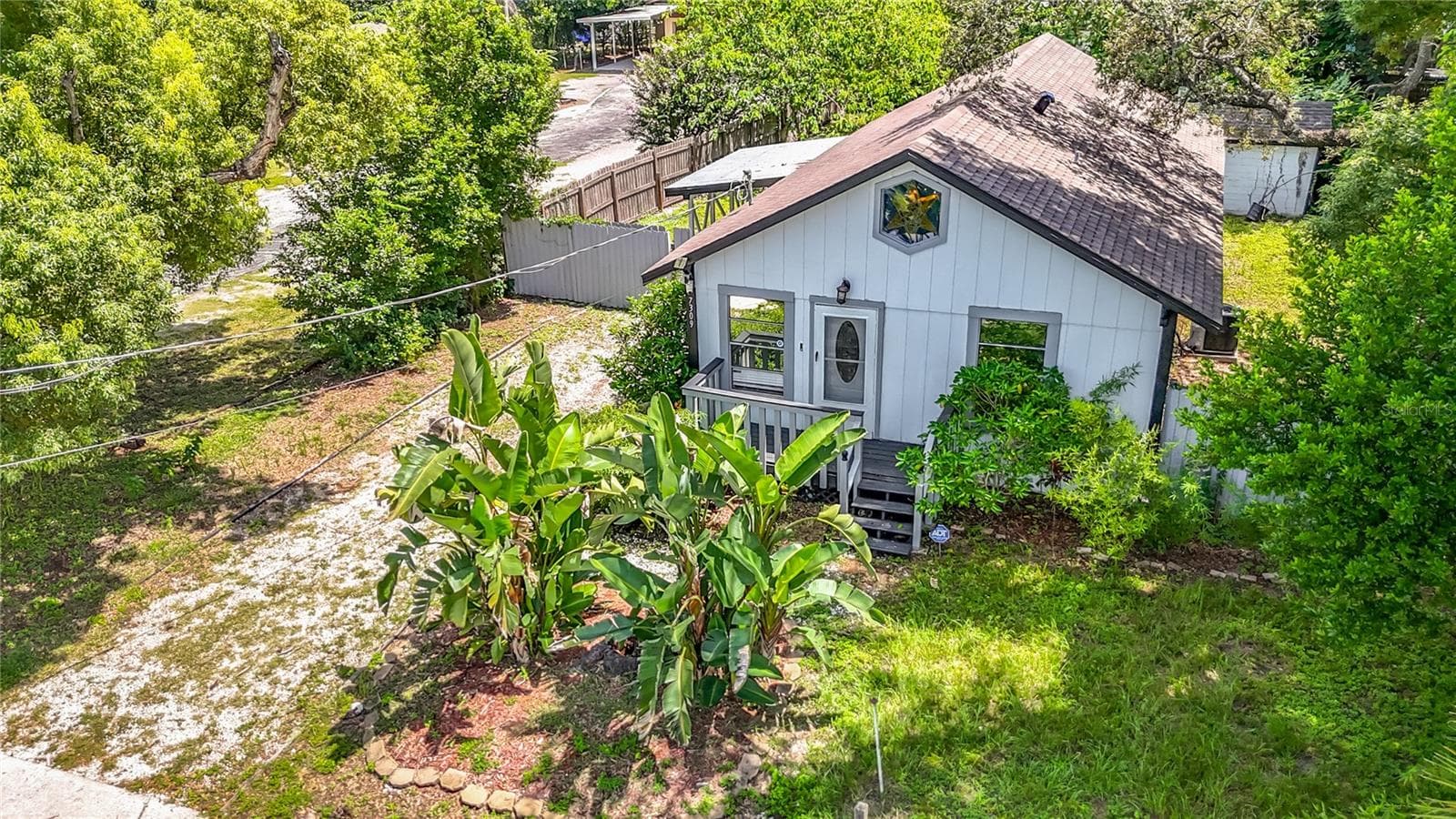 Single Family Residence at 7309 N HUNTLEY AVE, TAMPA, photo 3 of 63