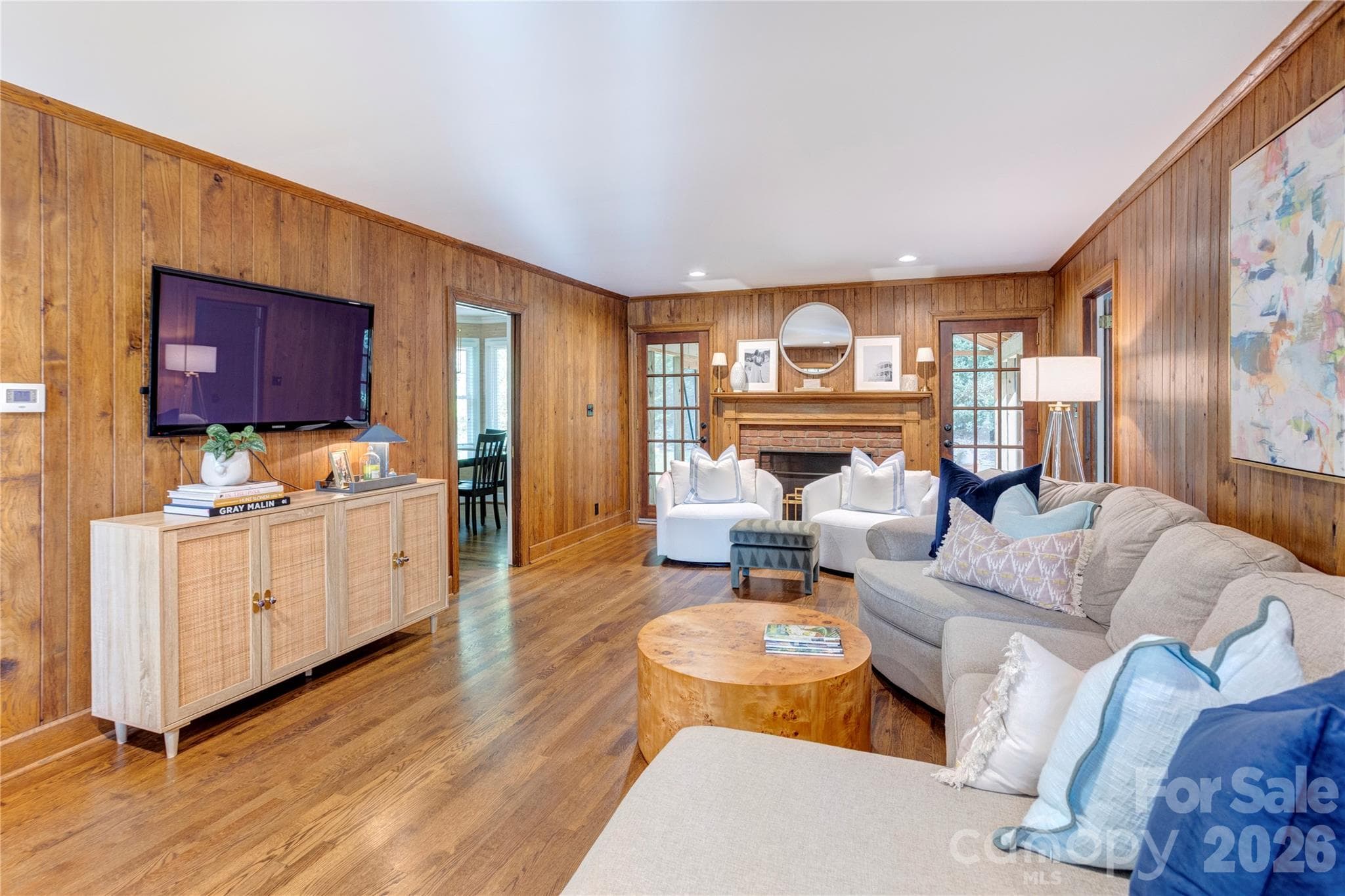A charming fireplace anchors the living room. - 215 Bethel Drive, Salisbury