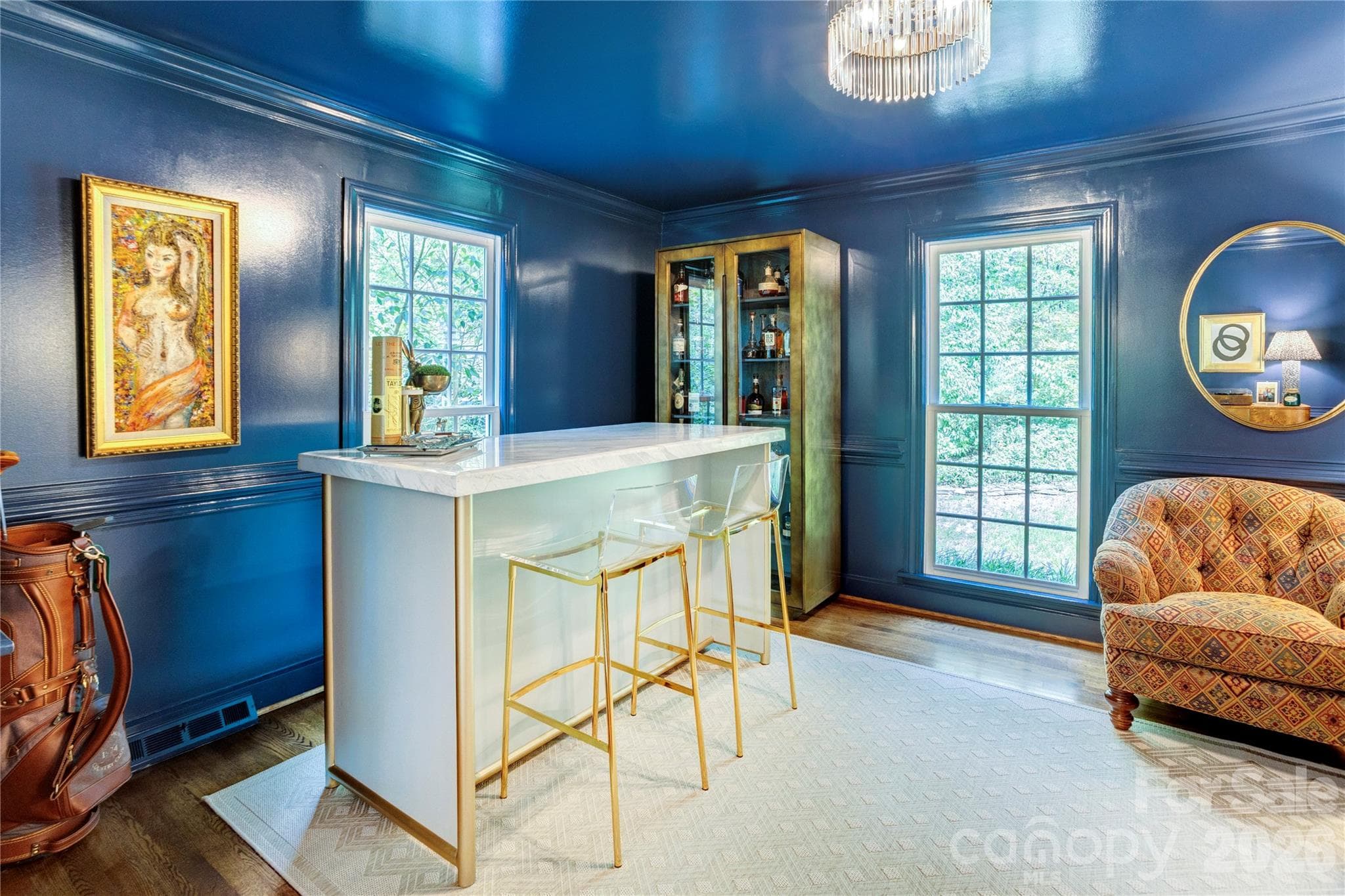 A moody, sophisticated bar (or sitting room) off the kitchen and dining room, made for entertaining. - 215 Bethel Drive, Salisbury