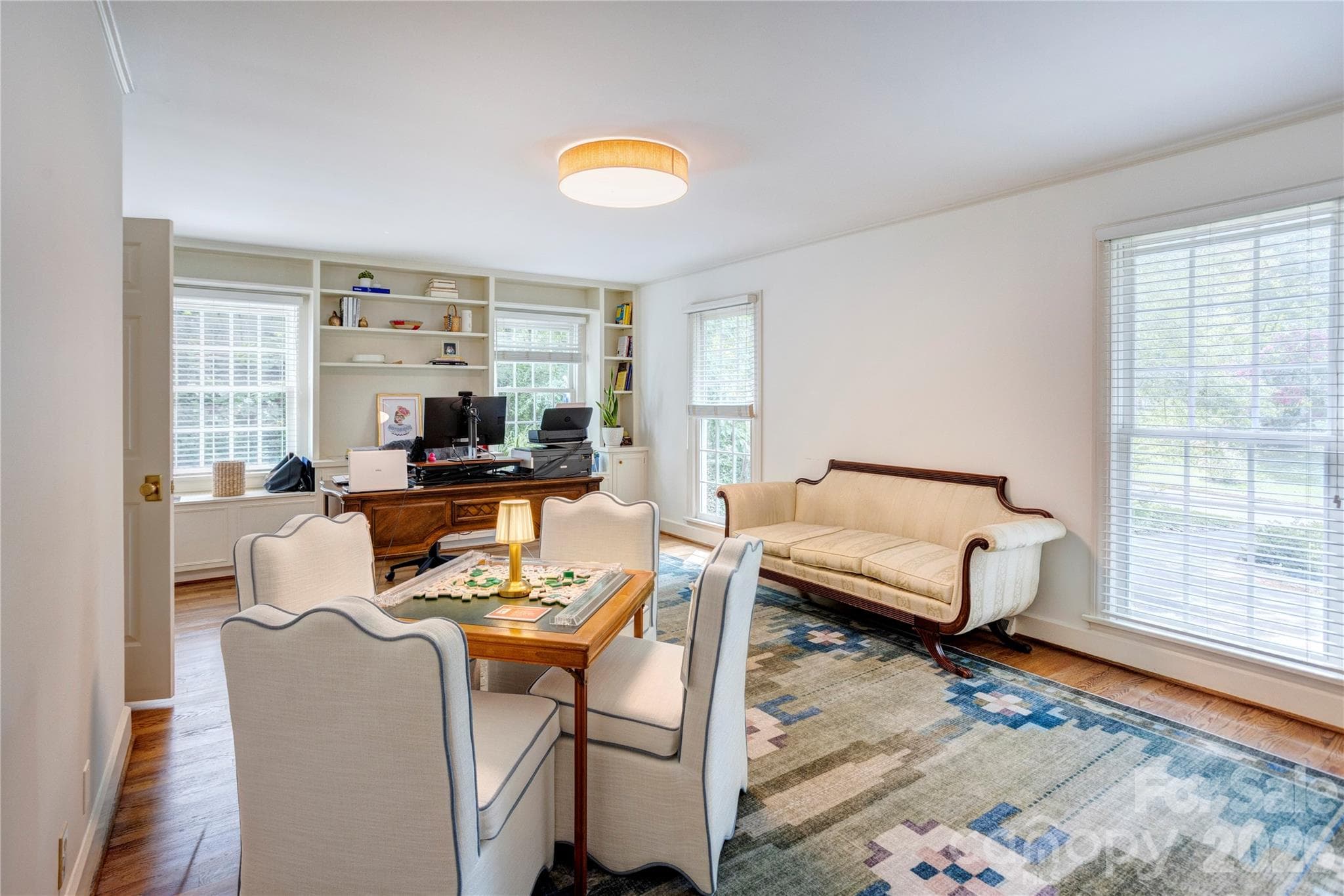 Currently used as an office, this main level bedroom could easily become a spacious primary suite. - 215 Bethel Drive, Salisbury
