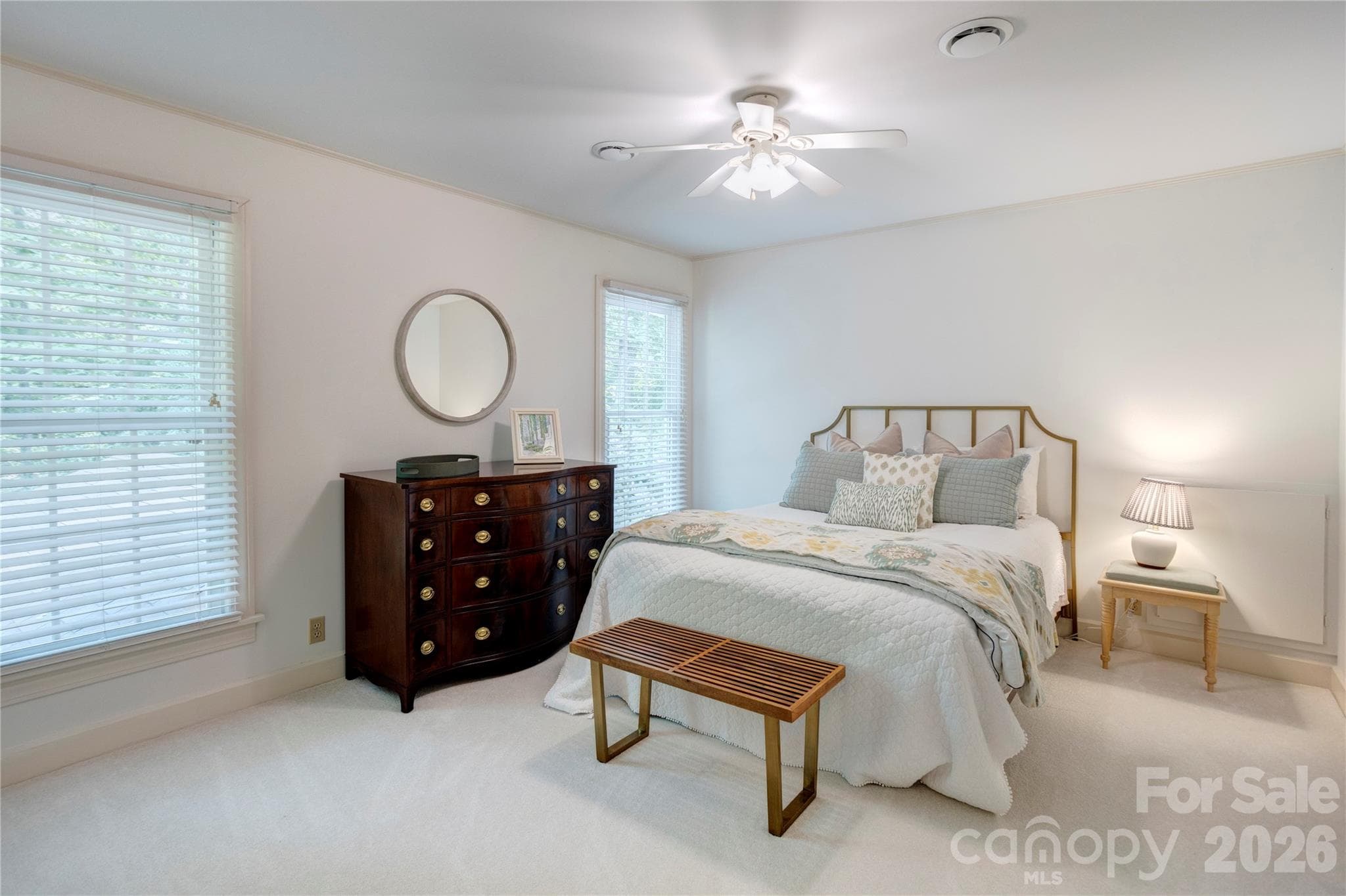 Another secondary bedroom offers a relaxing space for guests. - 215 Bethel Drive, Salisbury