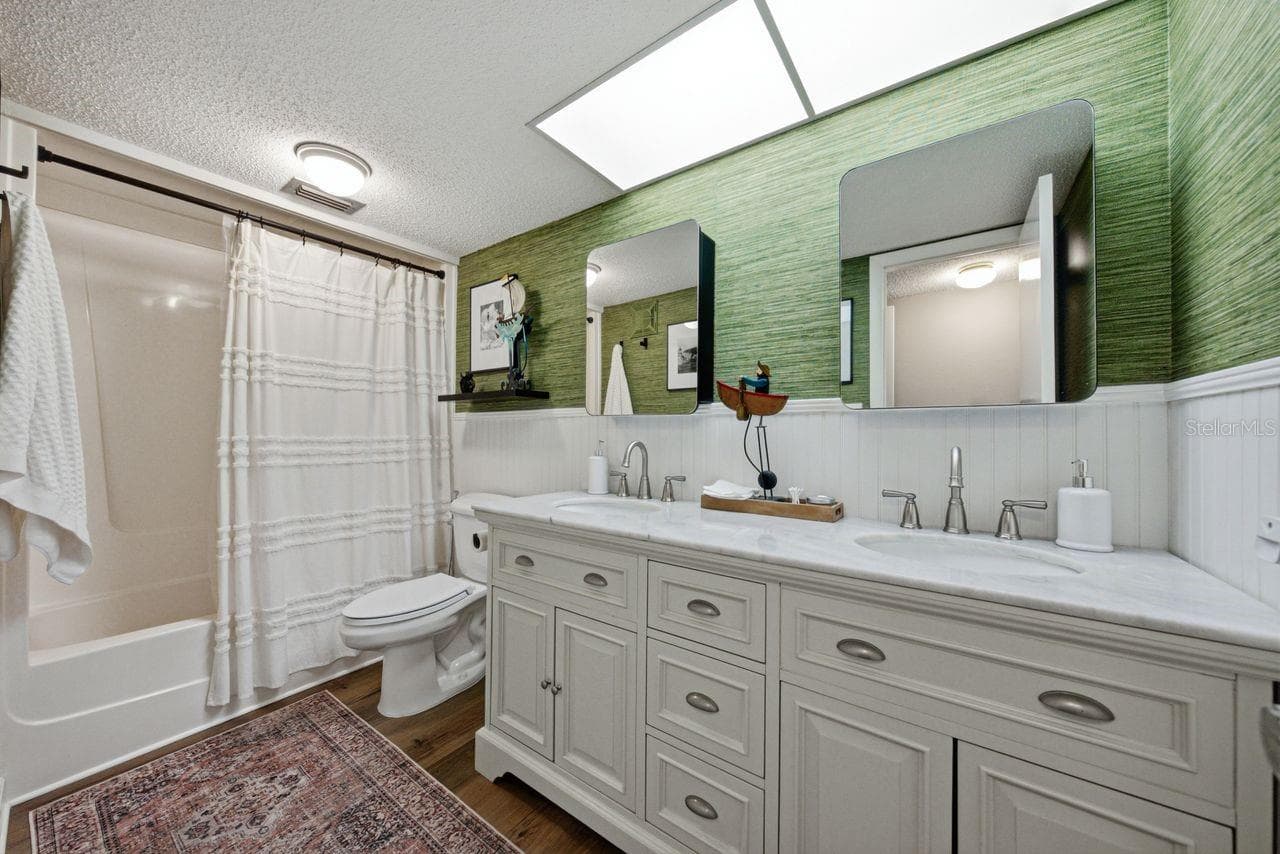 Primary bath features dual sinks - 1655 S HIGHLAND AVE #I379, CLEARWATER
